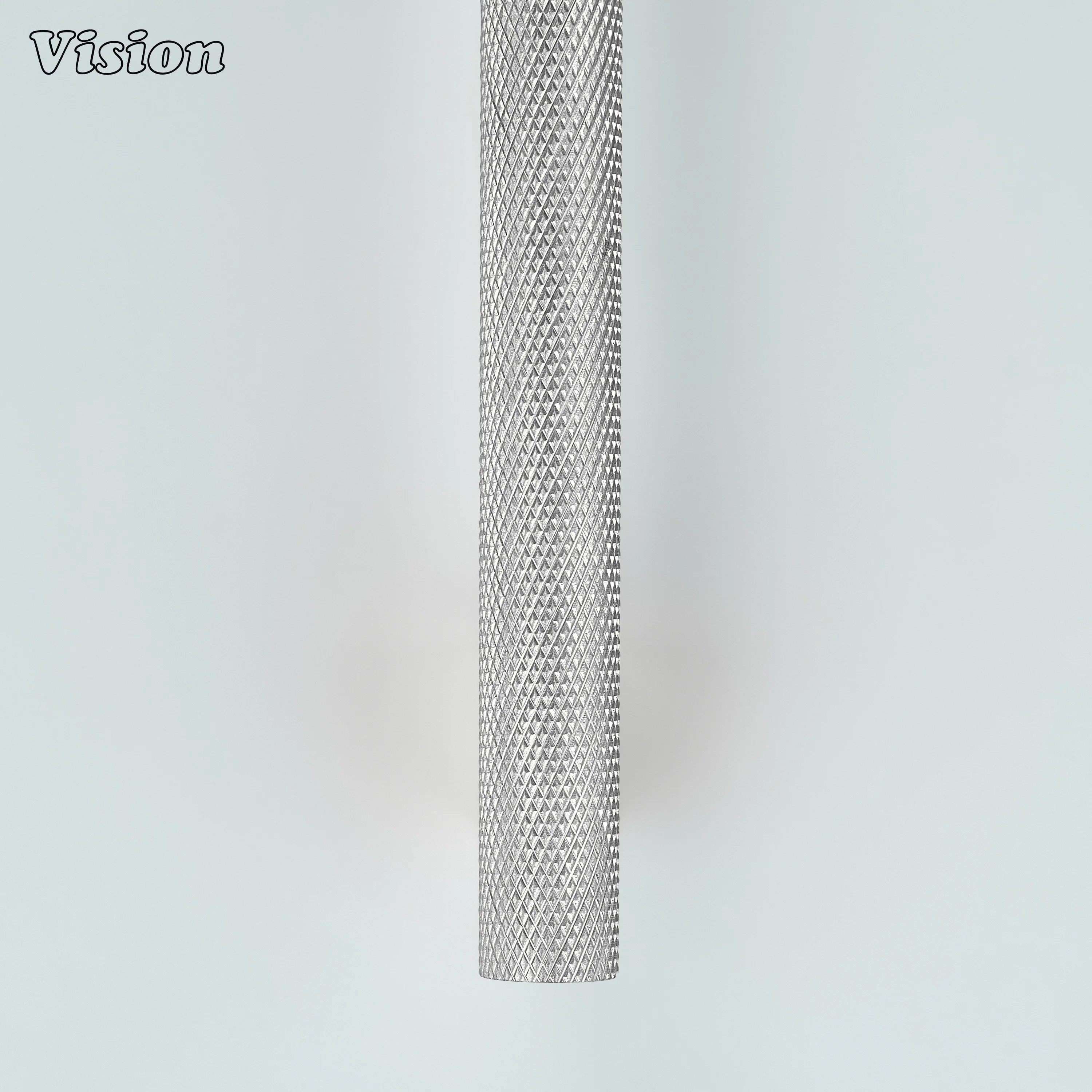 Silver knurled brass handle mounted on cabinet doors