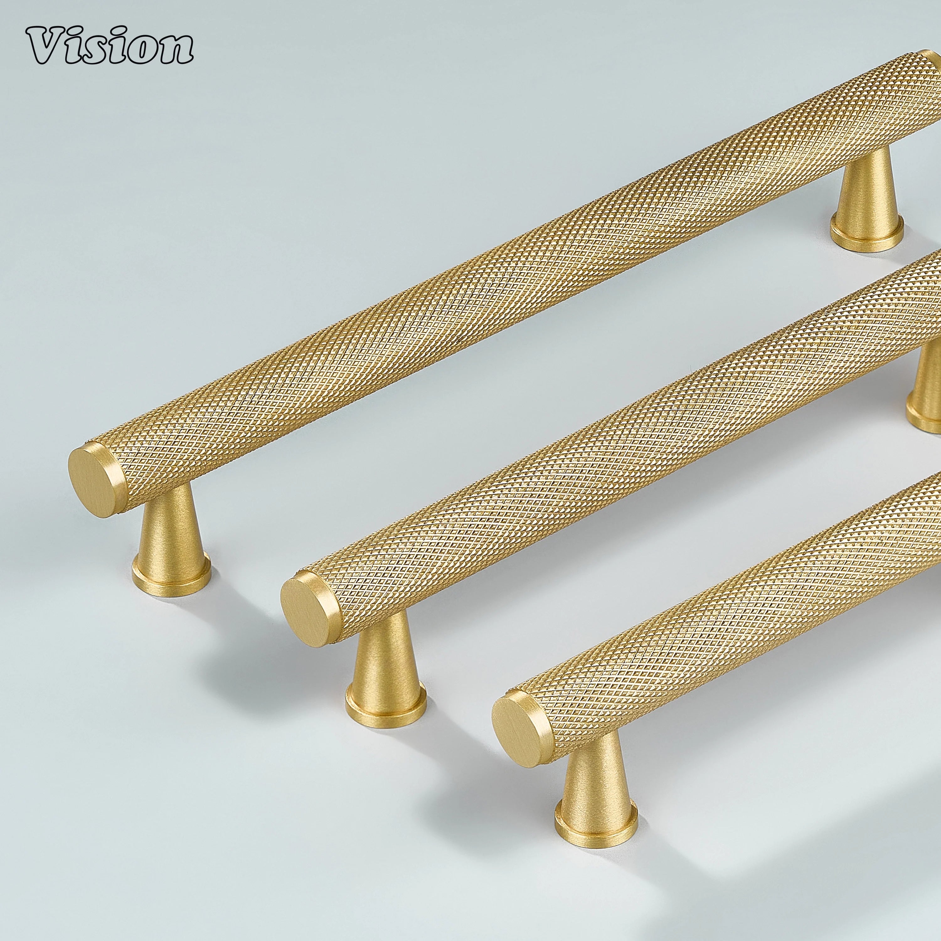 Gold textured knurled handle installed on dresser drawers.