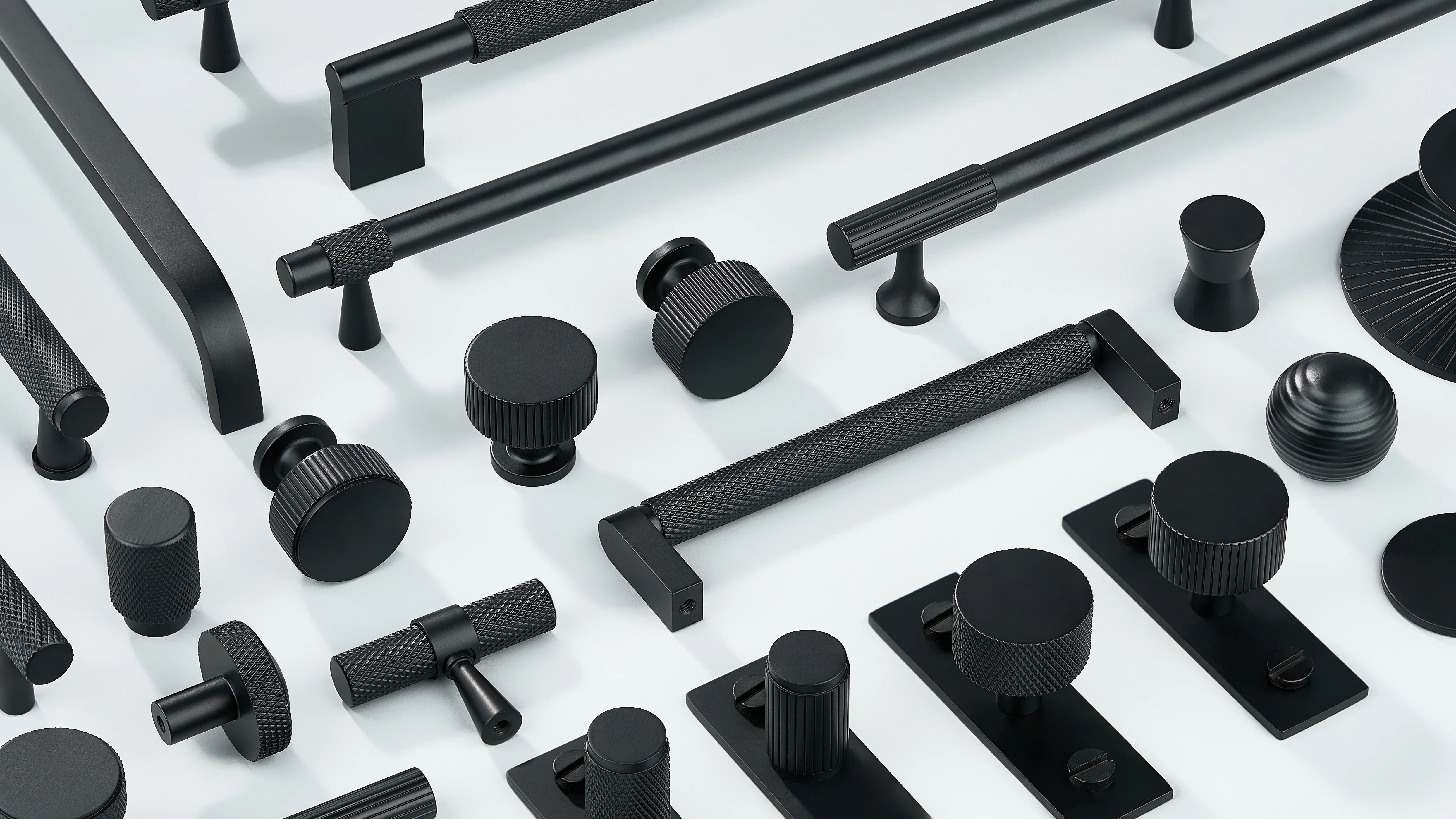 Cabinet handles in diamond knurling, linear knurling and curve shape along with cabinet knobs in round shape, sphere shape with or without back-plate in black finish