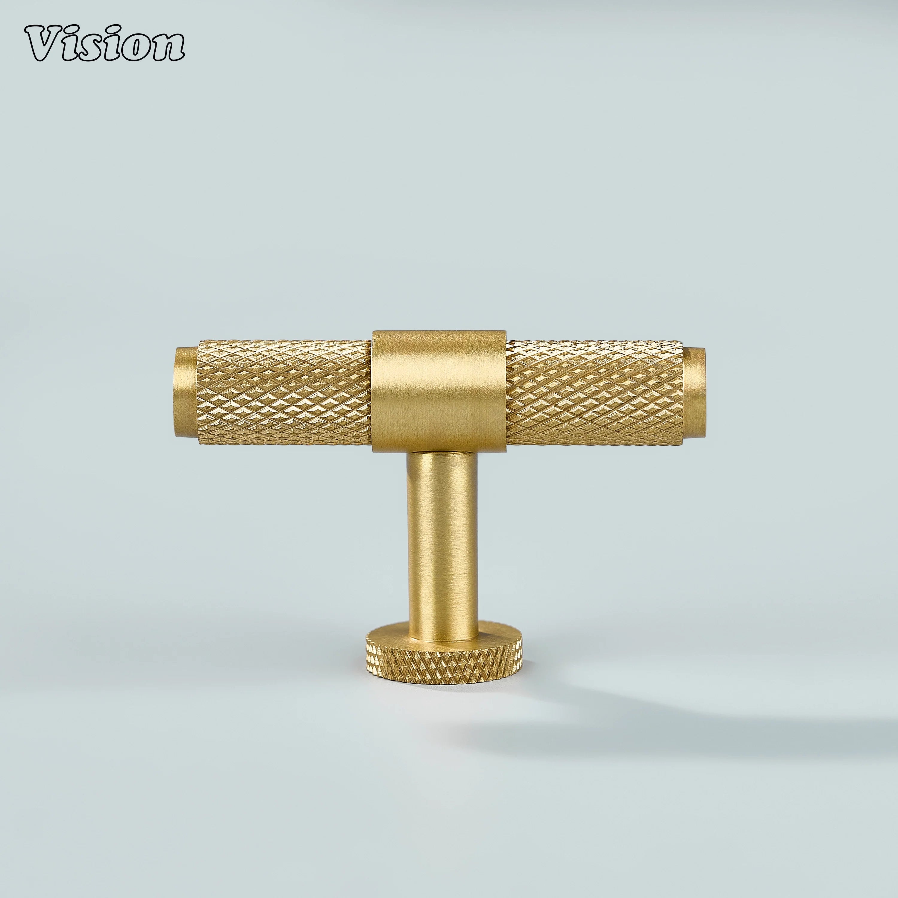 Sleek gold brass T-knob with ringed texture for cupboards.