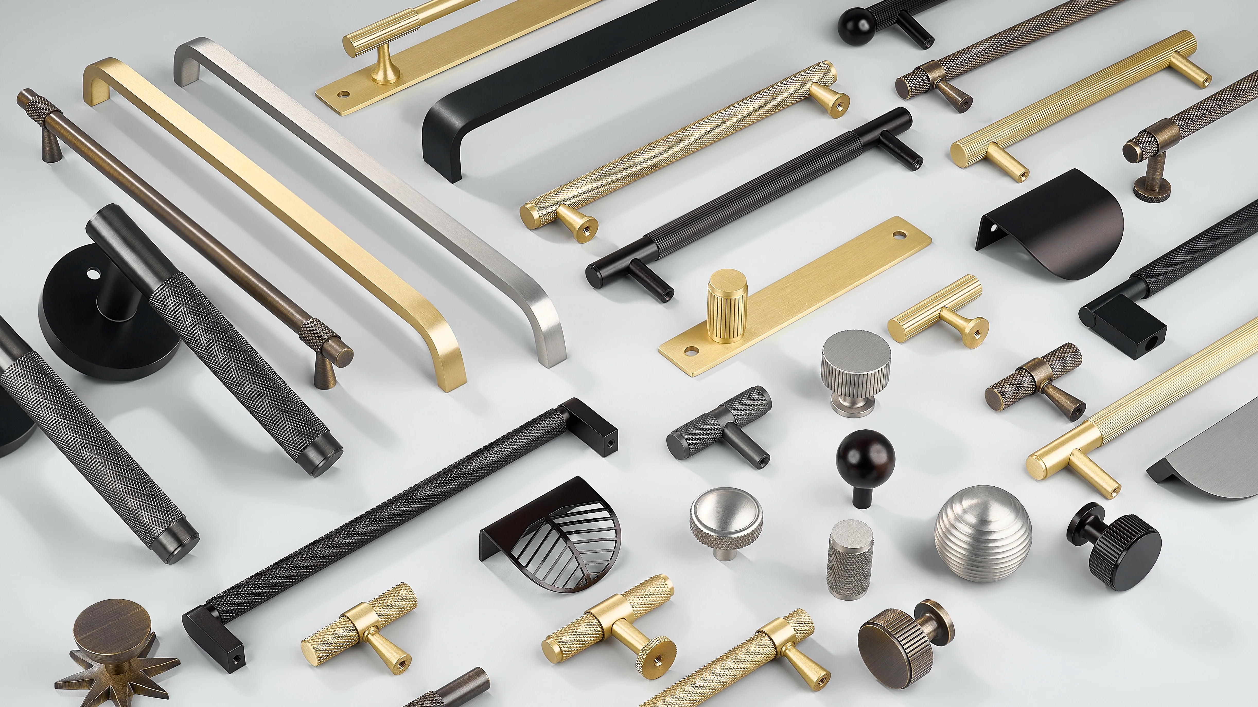 Cabinet Handles in diamond knurling, linear knurling and curve without knurling in oil rubbed bronze, antique bronze, gold, silver and black finishes. Cabinet knobs in diamond knurling, linear knurling with/without back-plate in oil rubbed bronze, antique bronze, gold, silver and black finishes. Cabinet Curved Profile Handles in oil rubbed bronze, antique bronze, gold, silver and black finishes. Door Lever Handle in black finish.