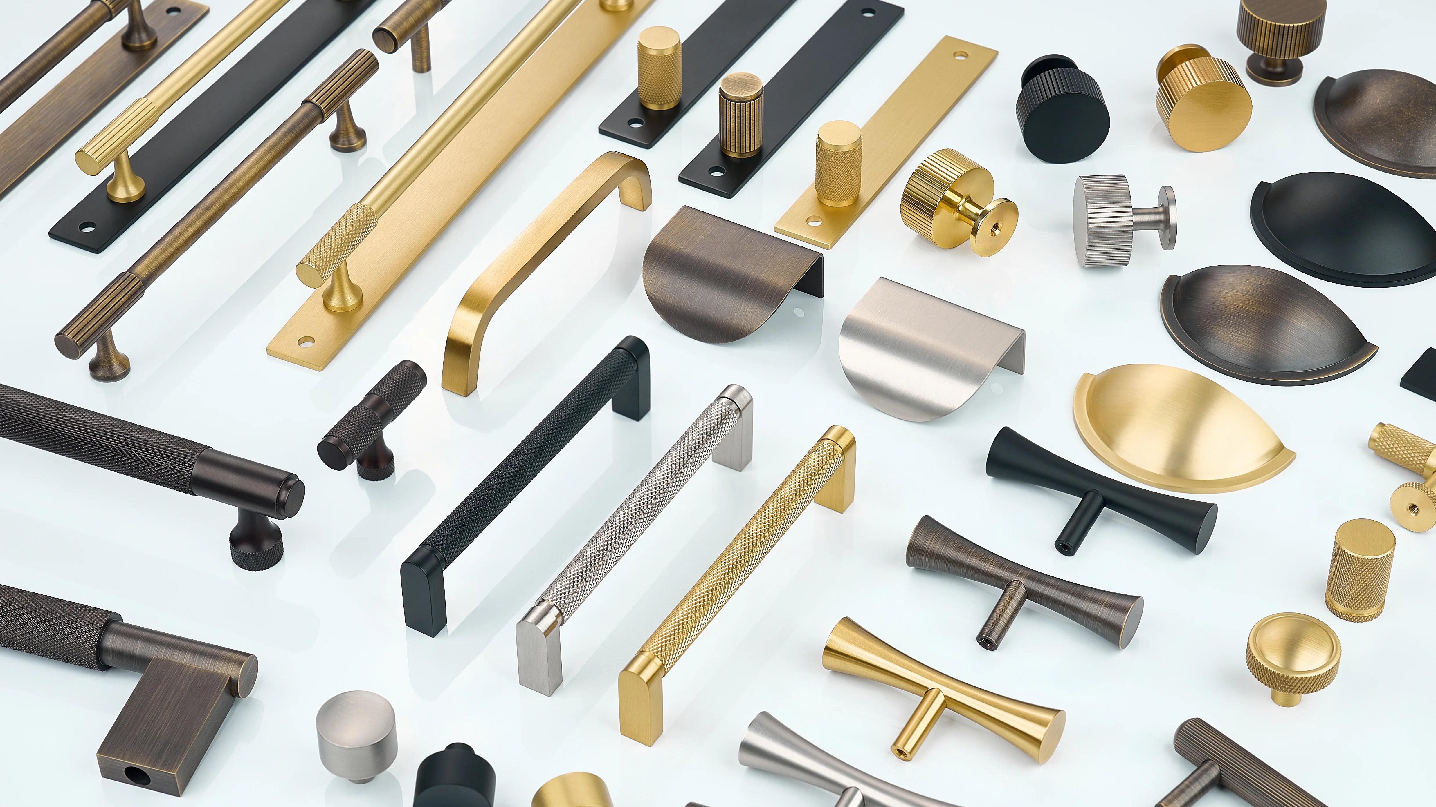 Cabinet Handles in diamond knurling, linear knurling and curve without knurling in oil rubbed bronze, antique bronze, gold, silver and black finishes. Cabinet knobs in diamond knurling, linear knurling with/without back-plate in oil rubbed bronze, antique bronze, gold, silver and black finishes. Cabinet Curved Profile Handles in oil rubbed bronze, antique bronze, gold, silver and black finishes.
