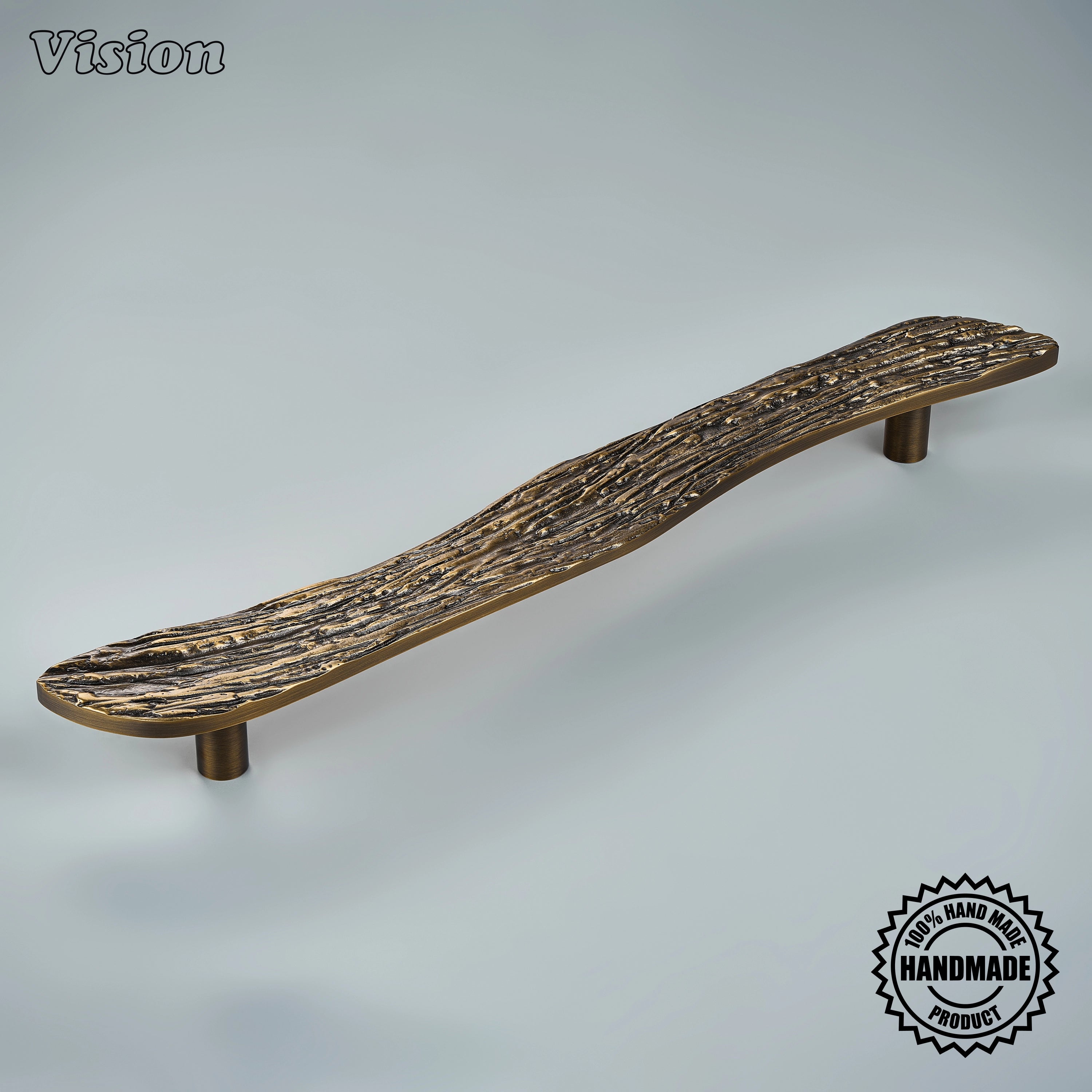Antique Bronze handcrafted appliance pull with deeply carved texture on custom pantry doors