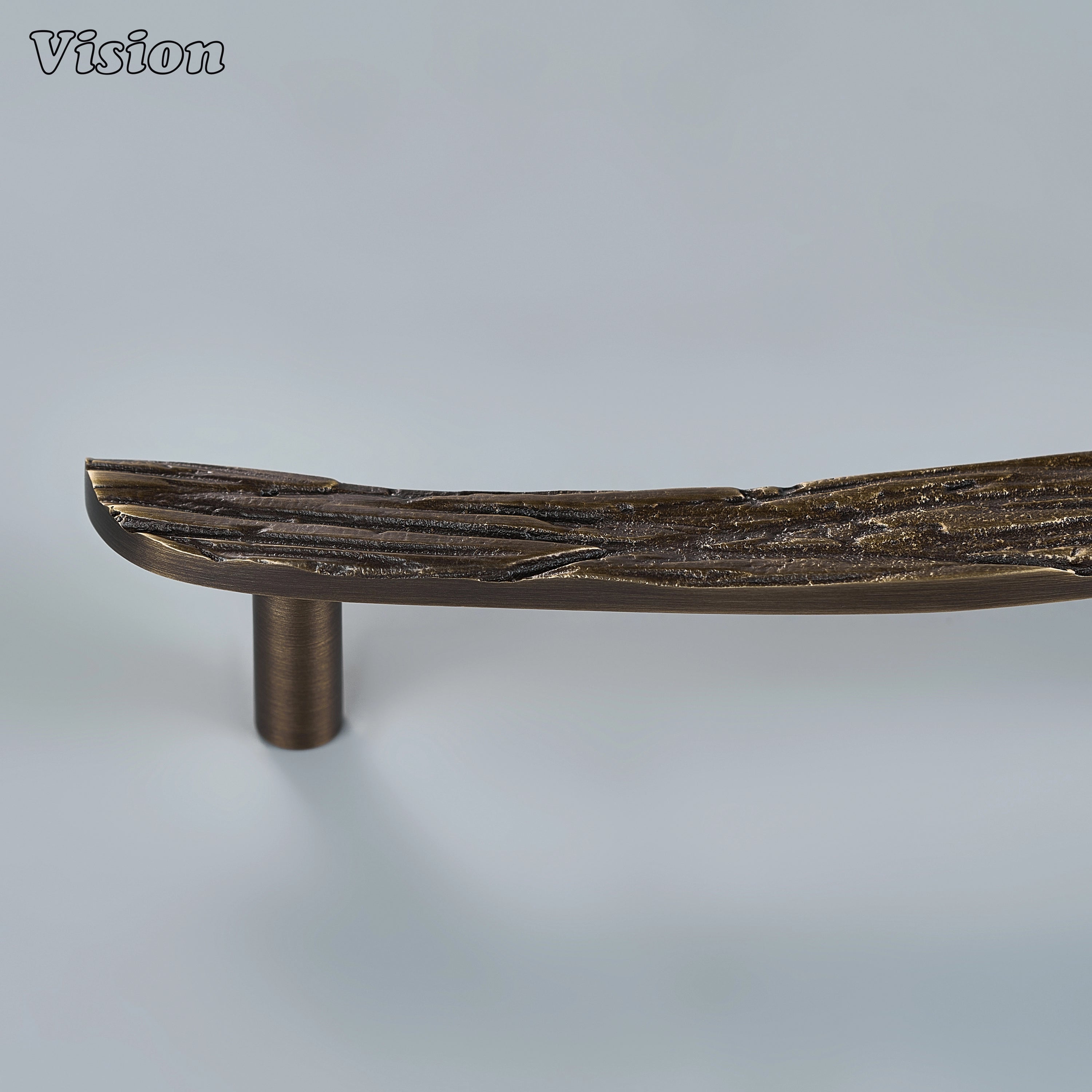Artisan antique bronze handcrafted cabinet pull with earthy profile for luxury dressing closets
