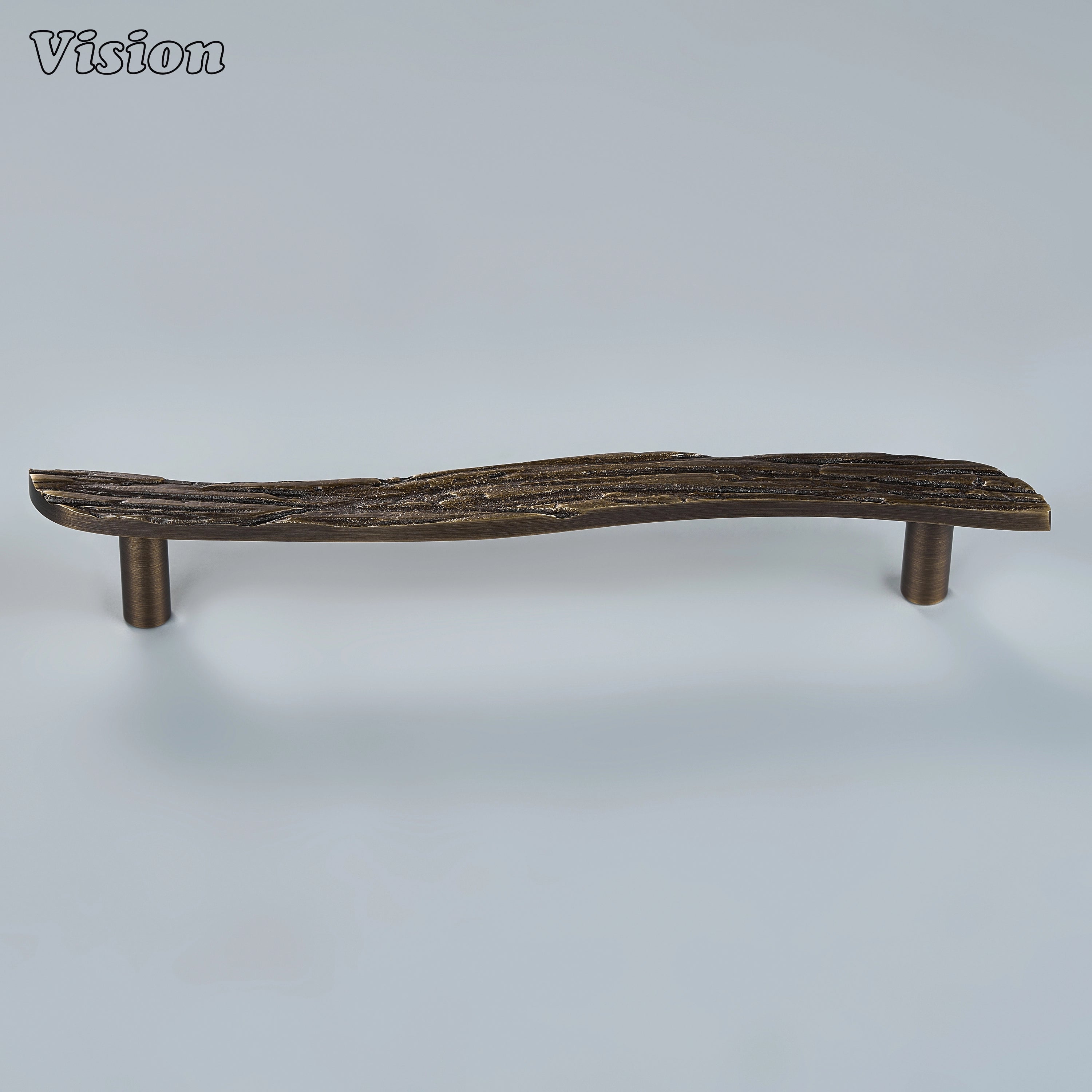 Handcrafted cabinet pull in antique bronze finish featuring a weathered branch profile for wardrobes