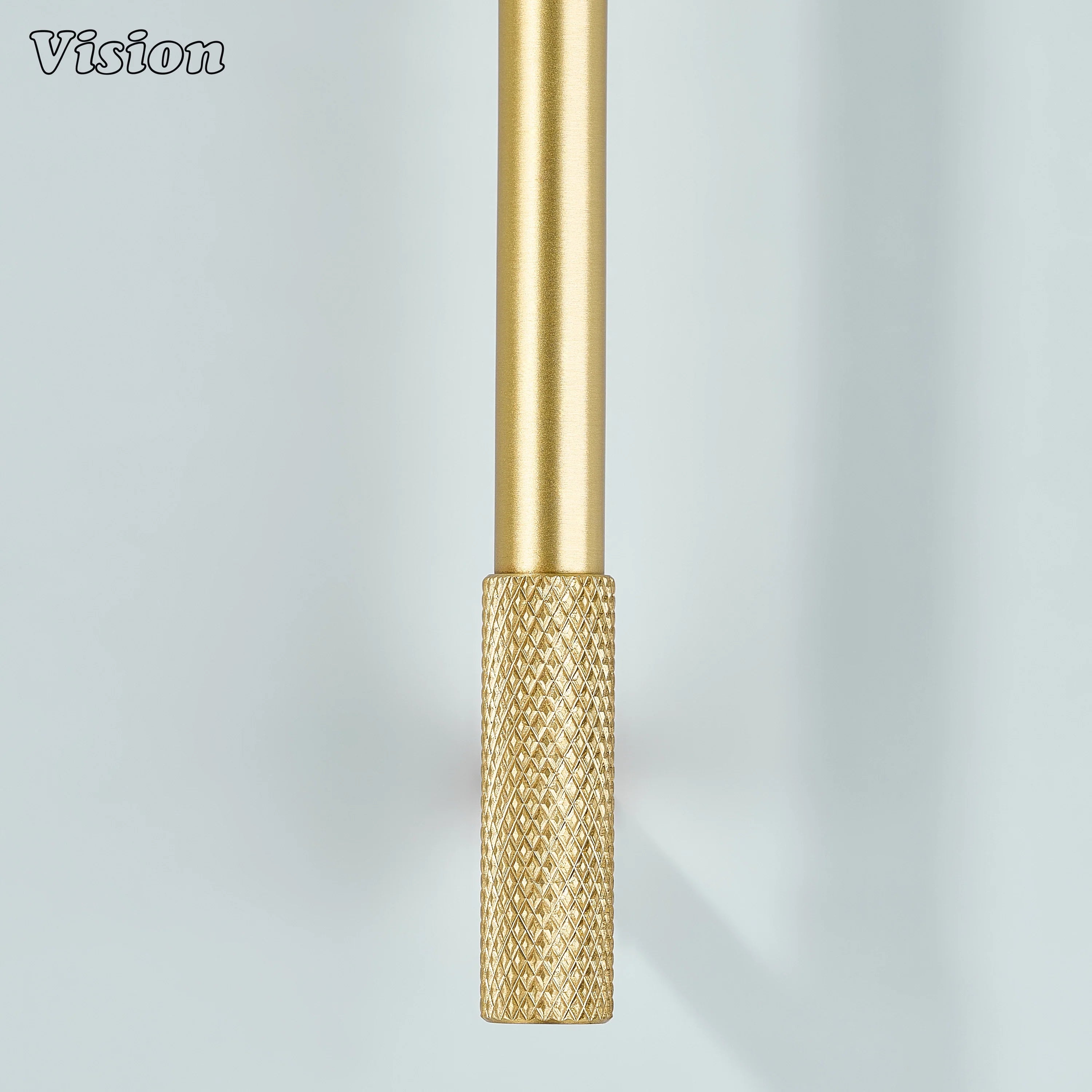 Gold knurled cabinet pull with cylindrical design