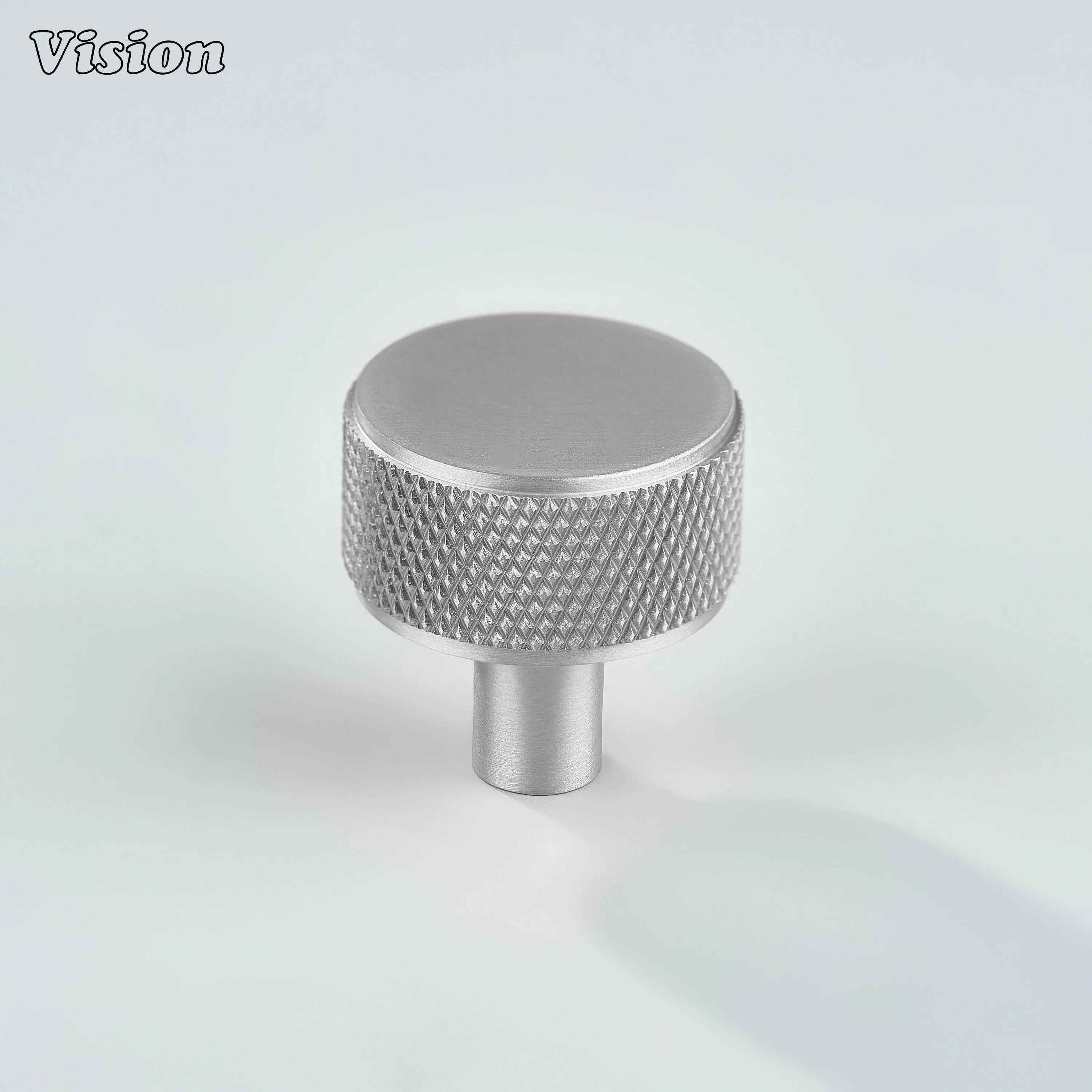 Silver knurled cabinet knob with brass construction for furniture