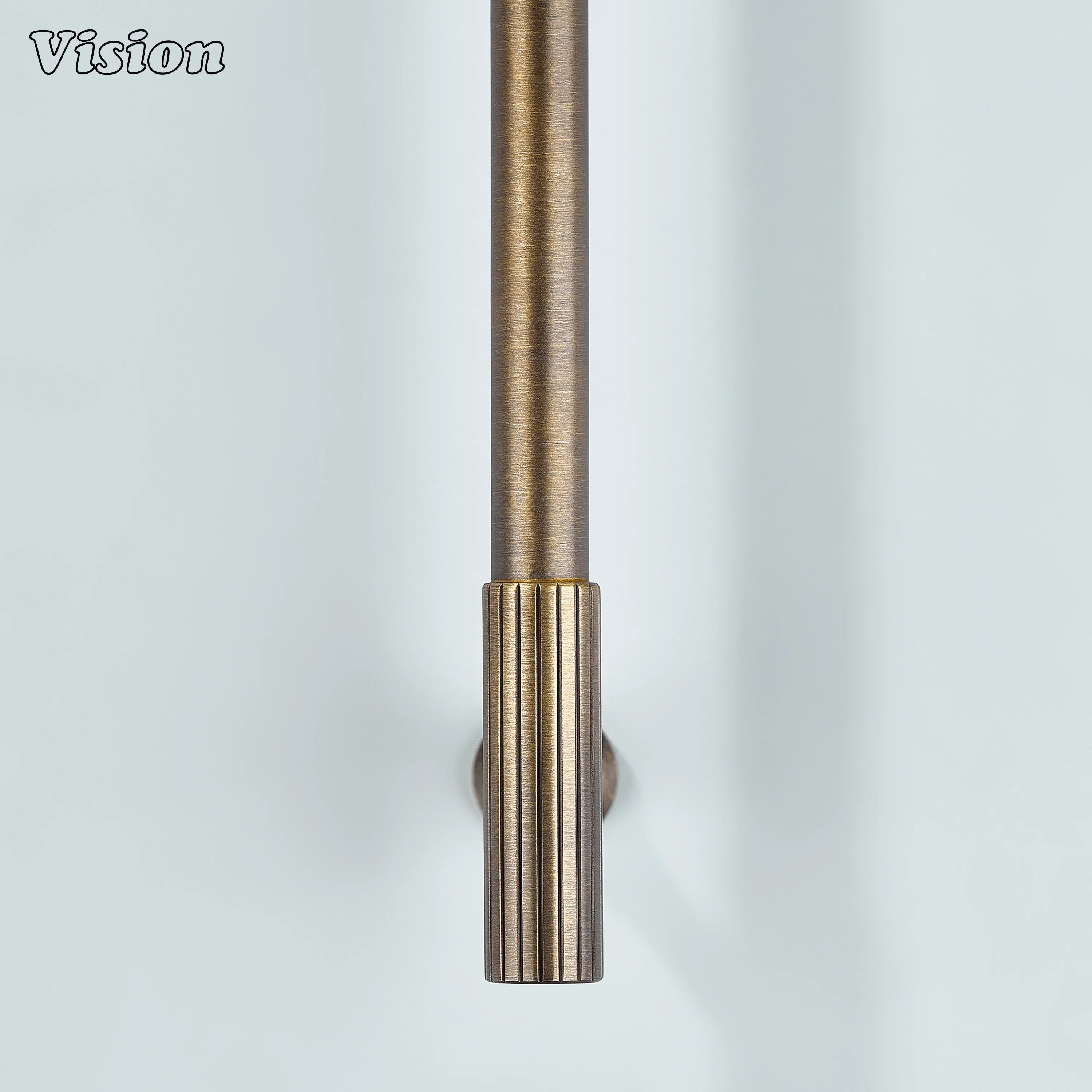 Solid brass handle in antique bronze with a sleek cylindrical profile.