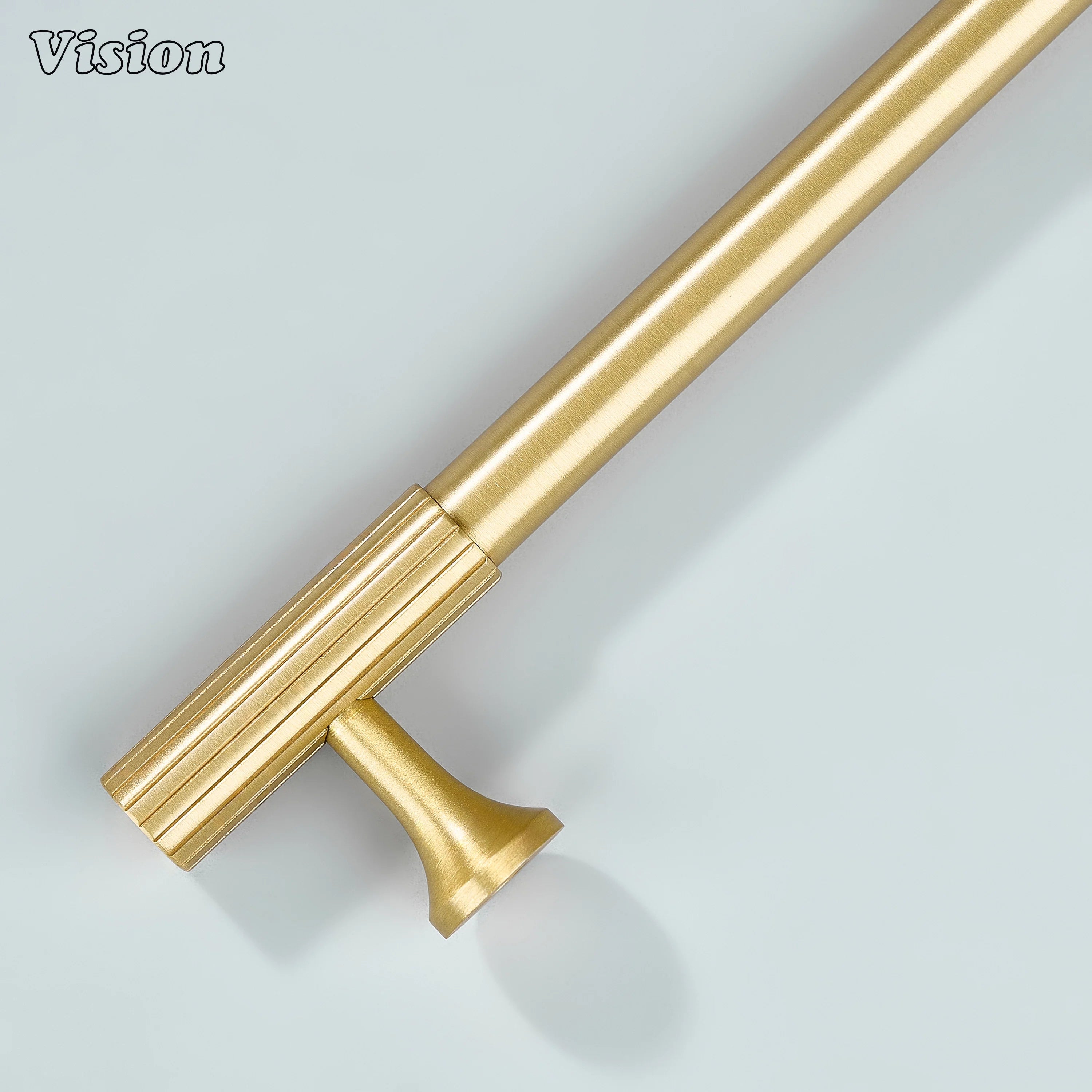 Gold knurled cabinet pull with sleek cylindrical design and elegant detailing.