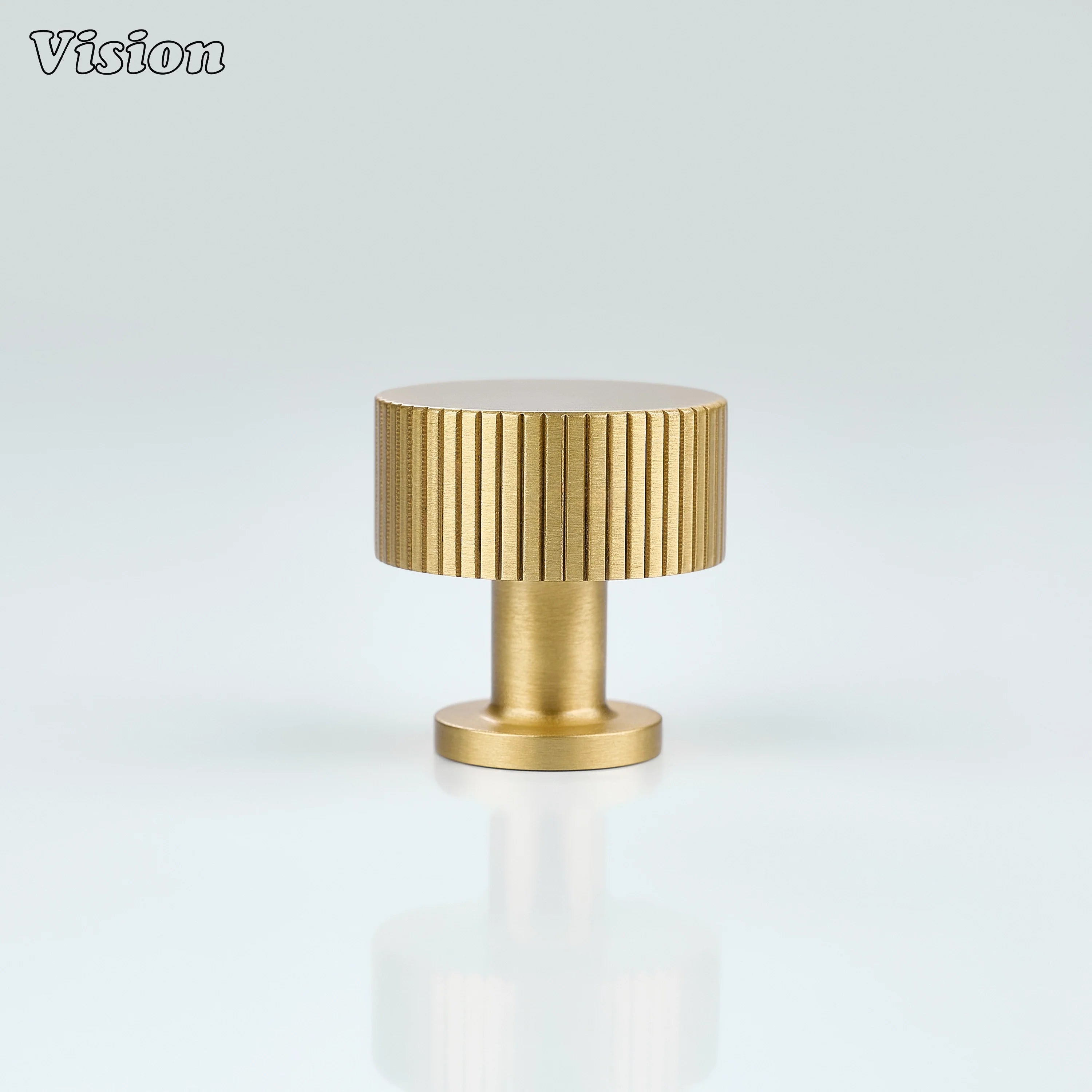 Gold linear knurled cabinet knob designed with round knob form for kitchen and furniture storage