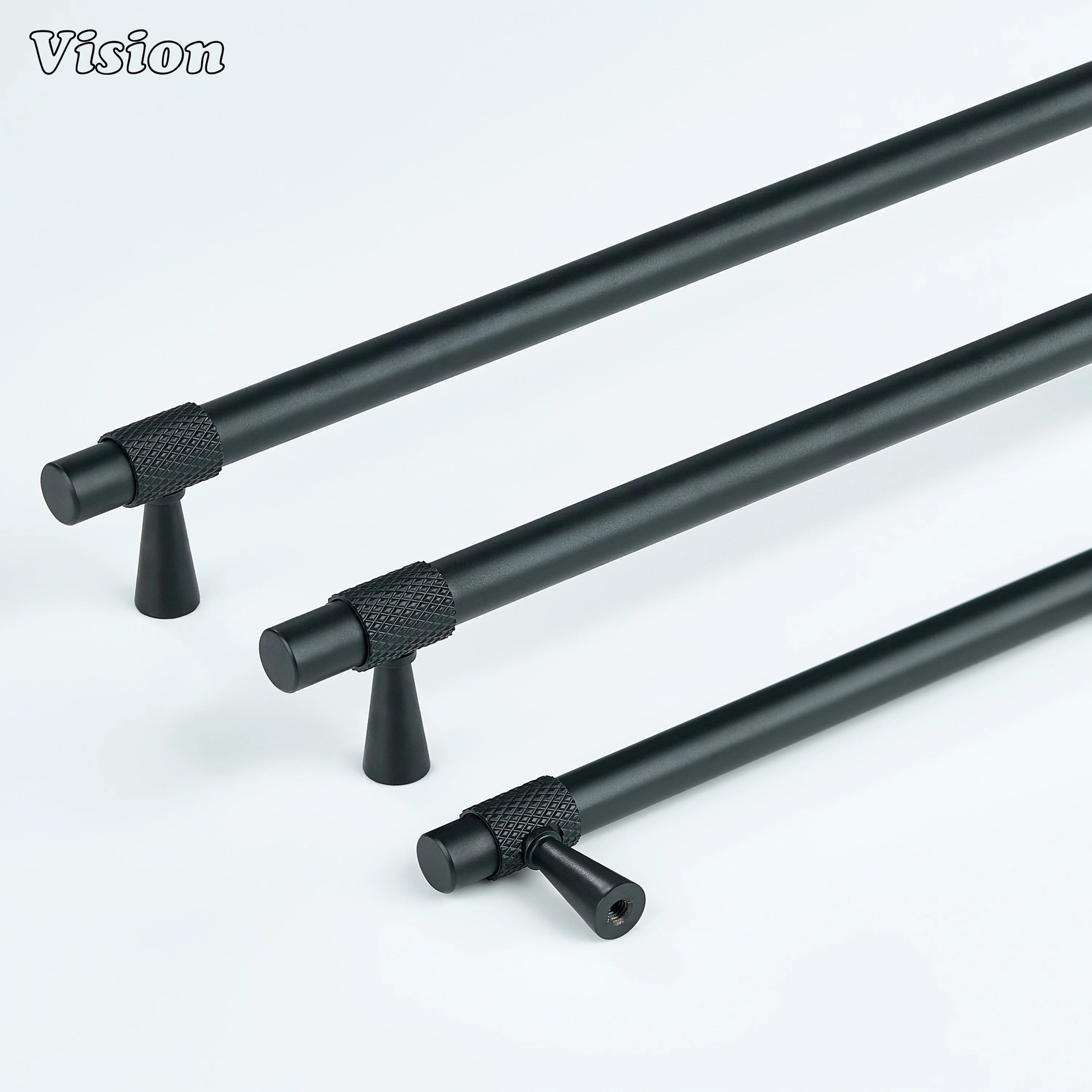Black cabinet handle with minimal design and textured rings for furniture use.