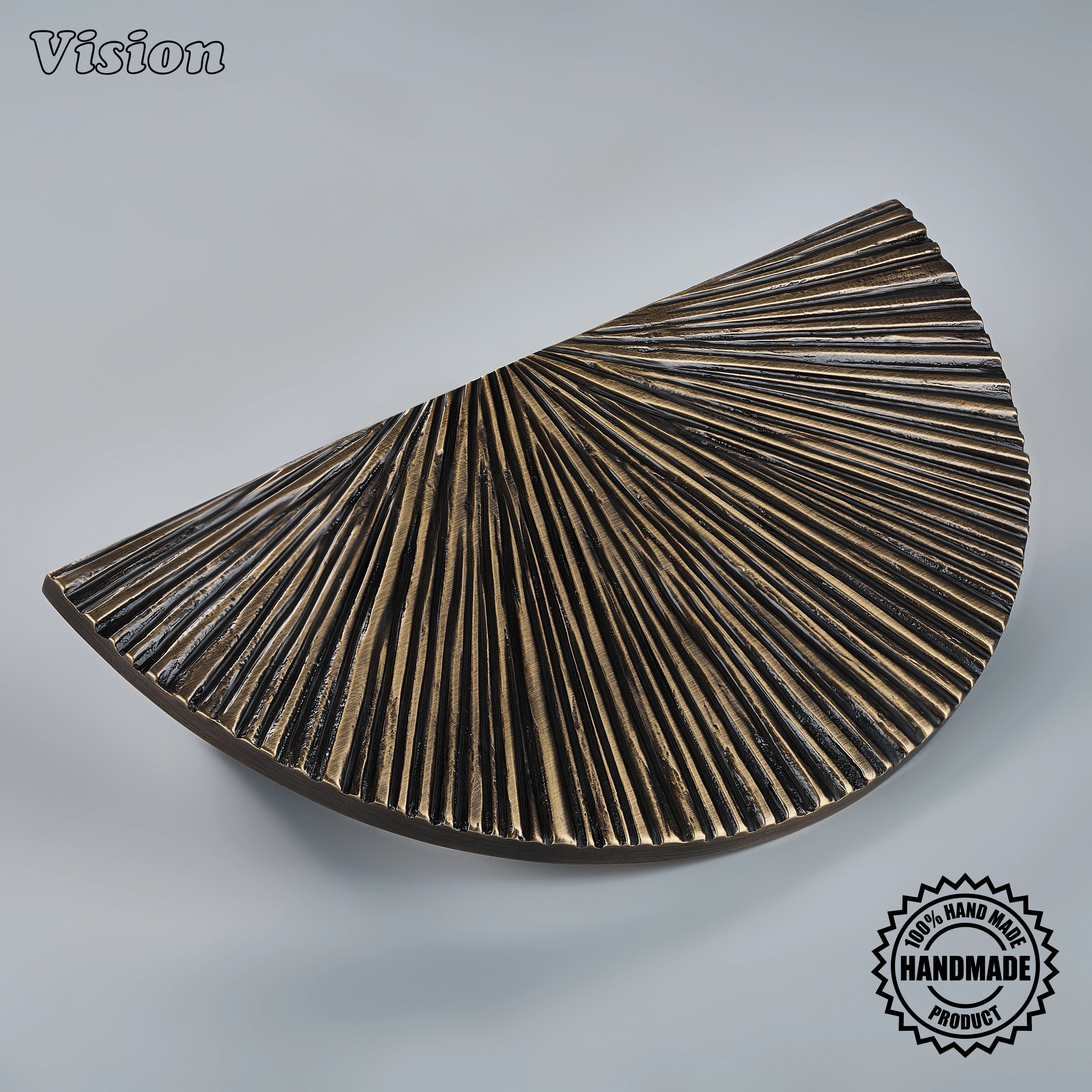 Antique Bronze handcrafted semi round door handle with radiating ridges on heavy double doors