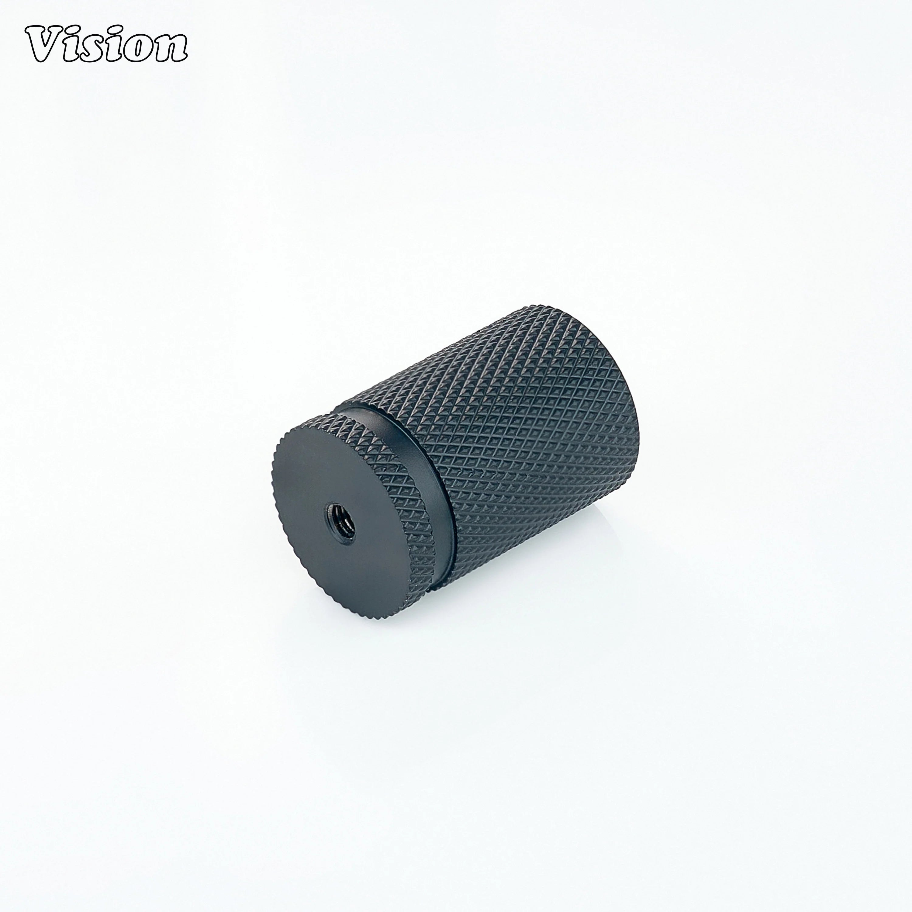 Black cylinder cabinet knob featuring textured knurling and solid base for cabinets