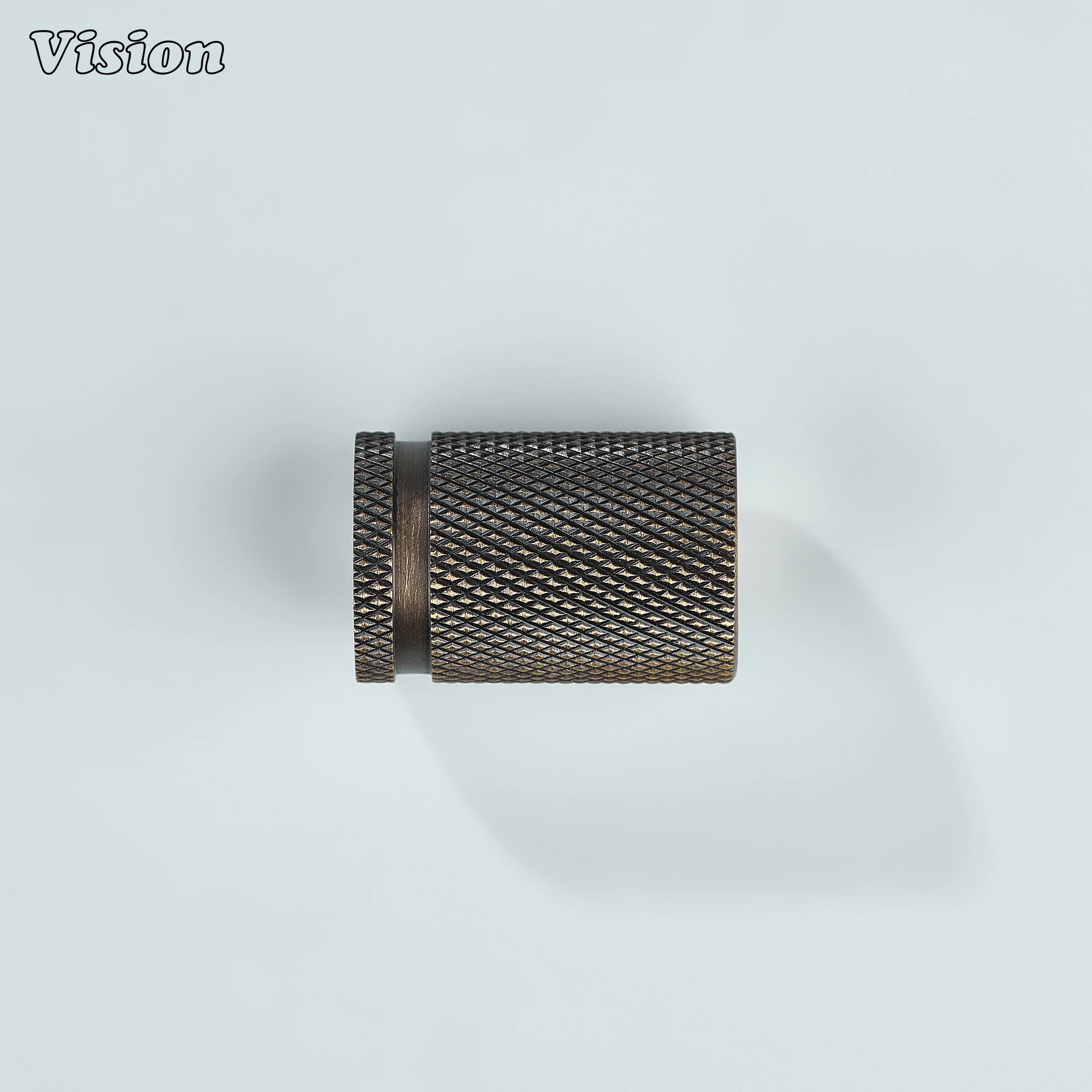Antique bronze cylinder-shaped cabinet knob with textured grip.