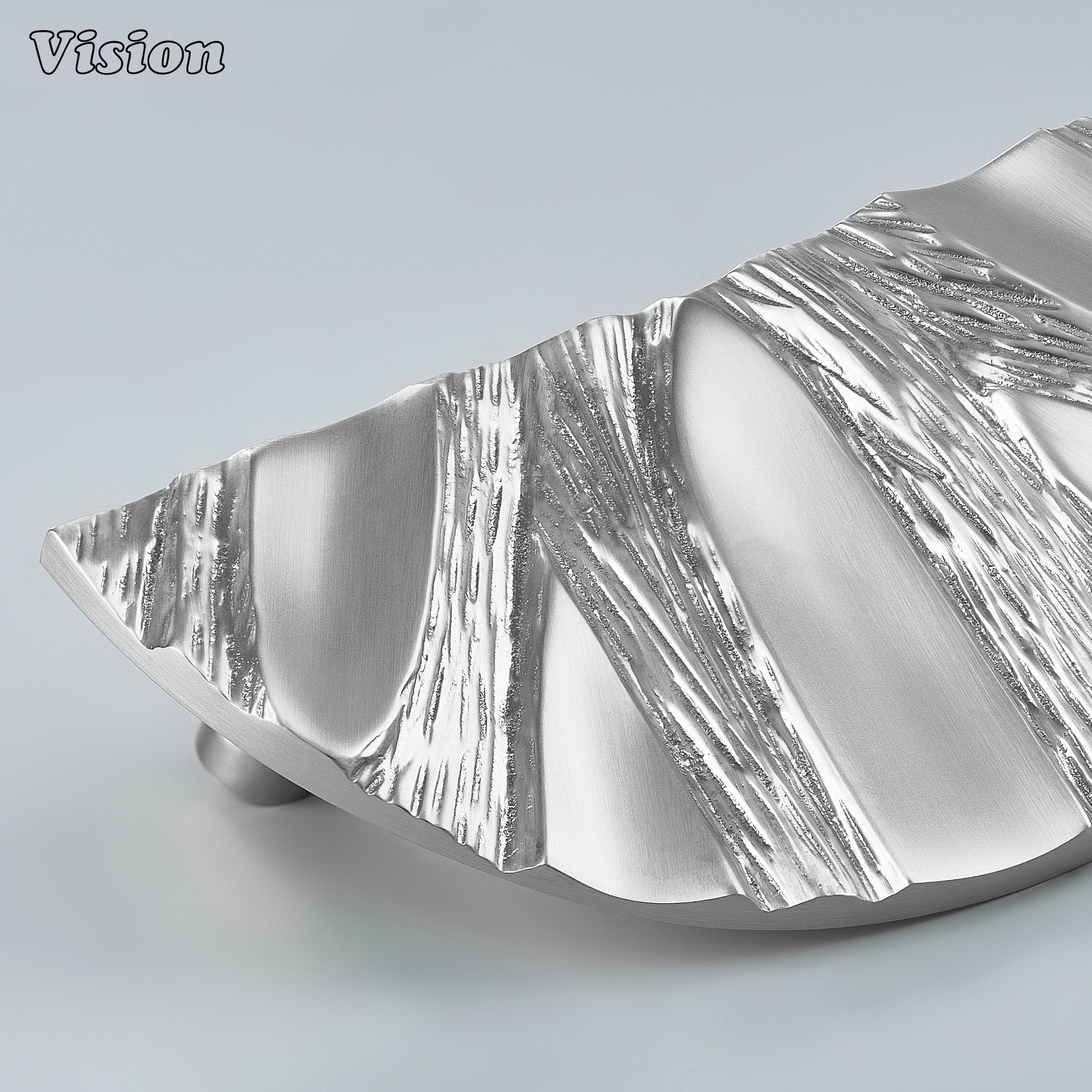 Silver organic textured brass door handle with handcrafted sculptural profile.