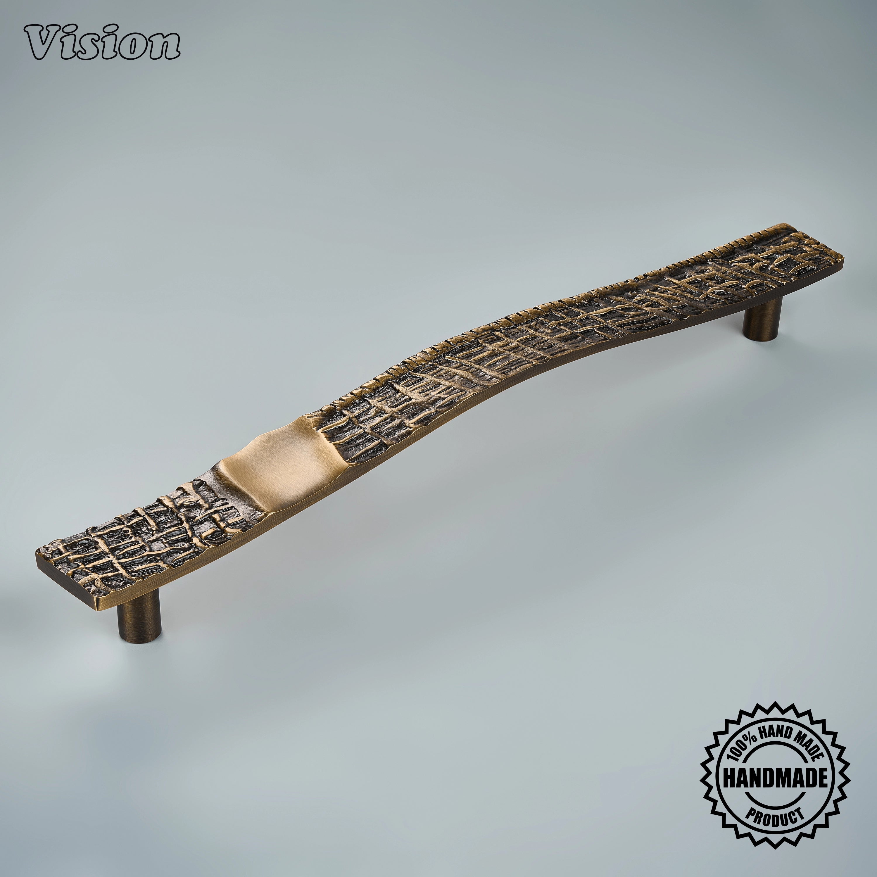 Antique Bronze handcrafted appliance pull with deeply carved woven texture on custom pantry doors