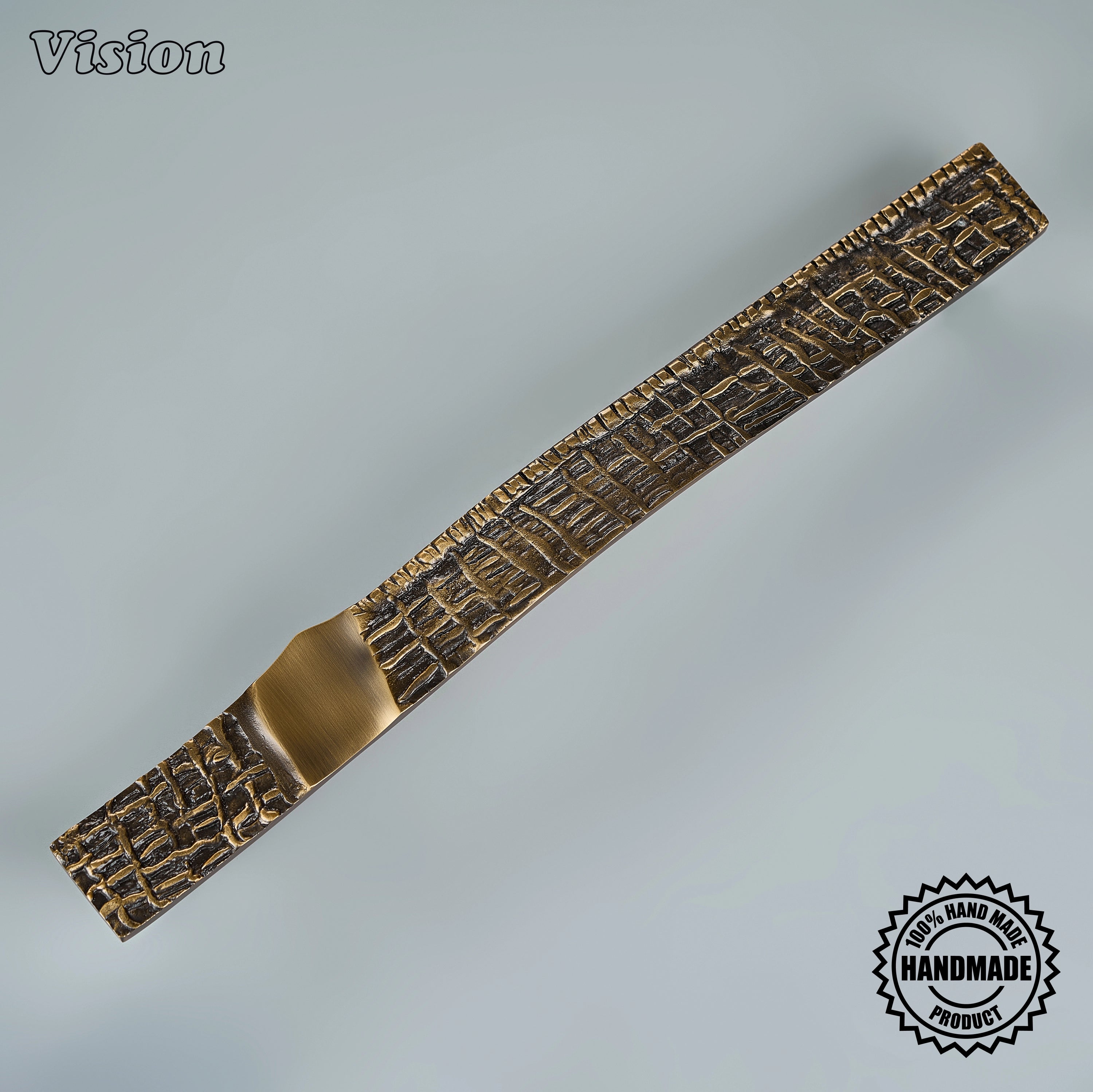 Antique bronze artisanal appliance handle with tactile woven surface for heavy interior double doors