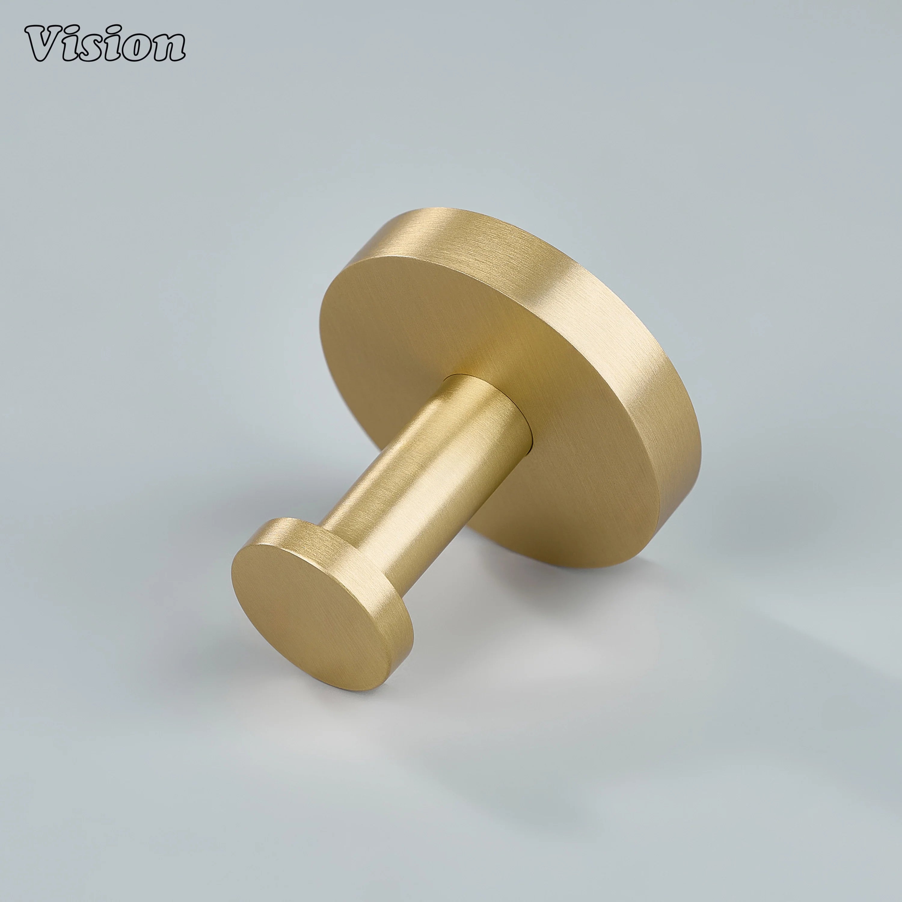 Minimal brass wall hook in Gold finish with circular mount for wardrobe organization