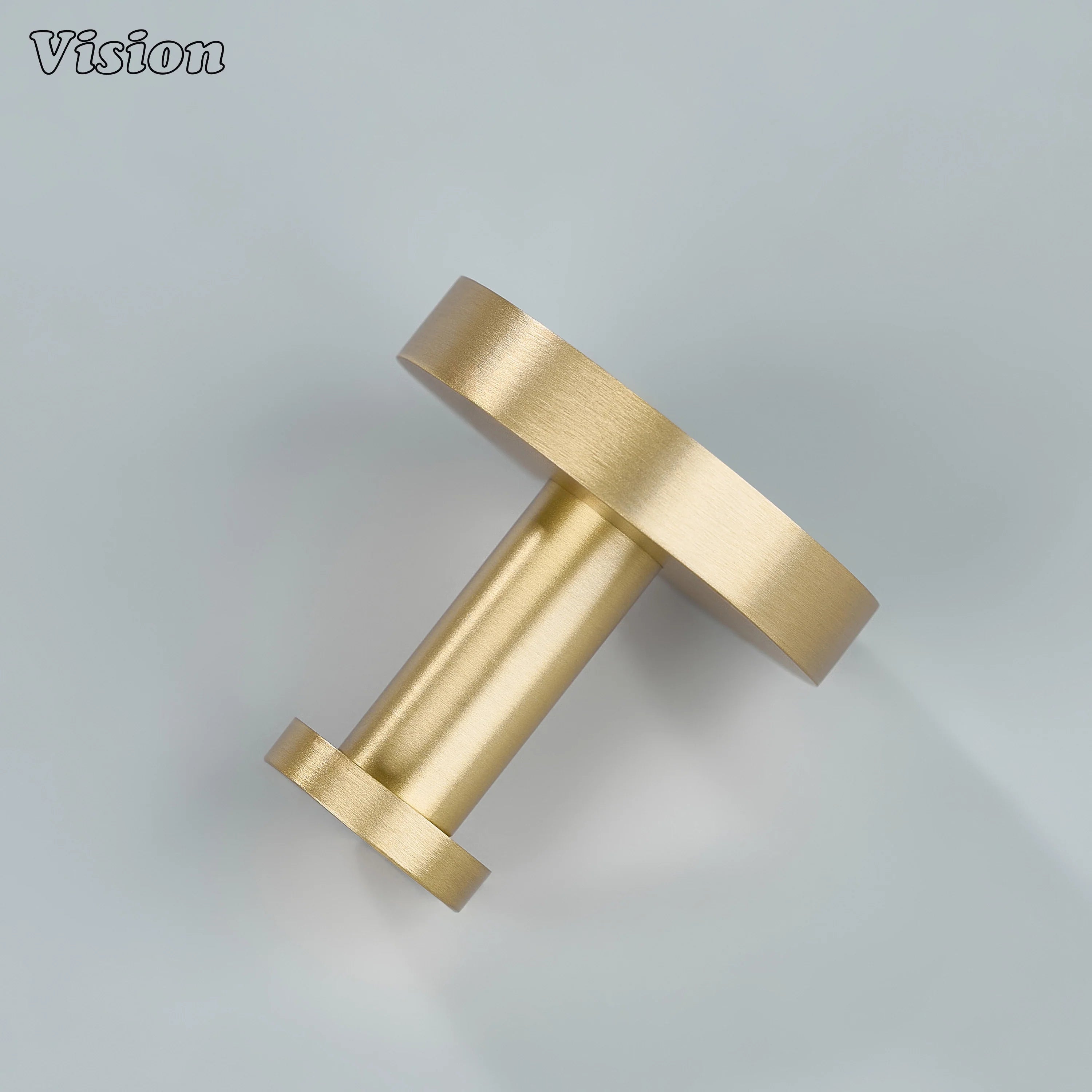 Solid brass wall hook in Gold with smooth cylindrical leg for coat storage on doors