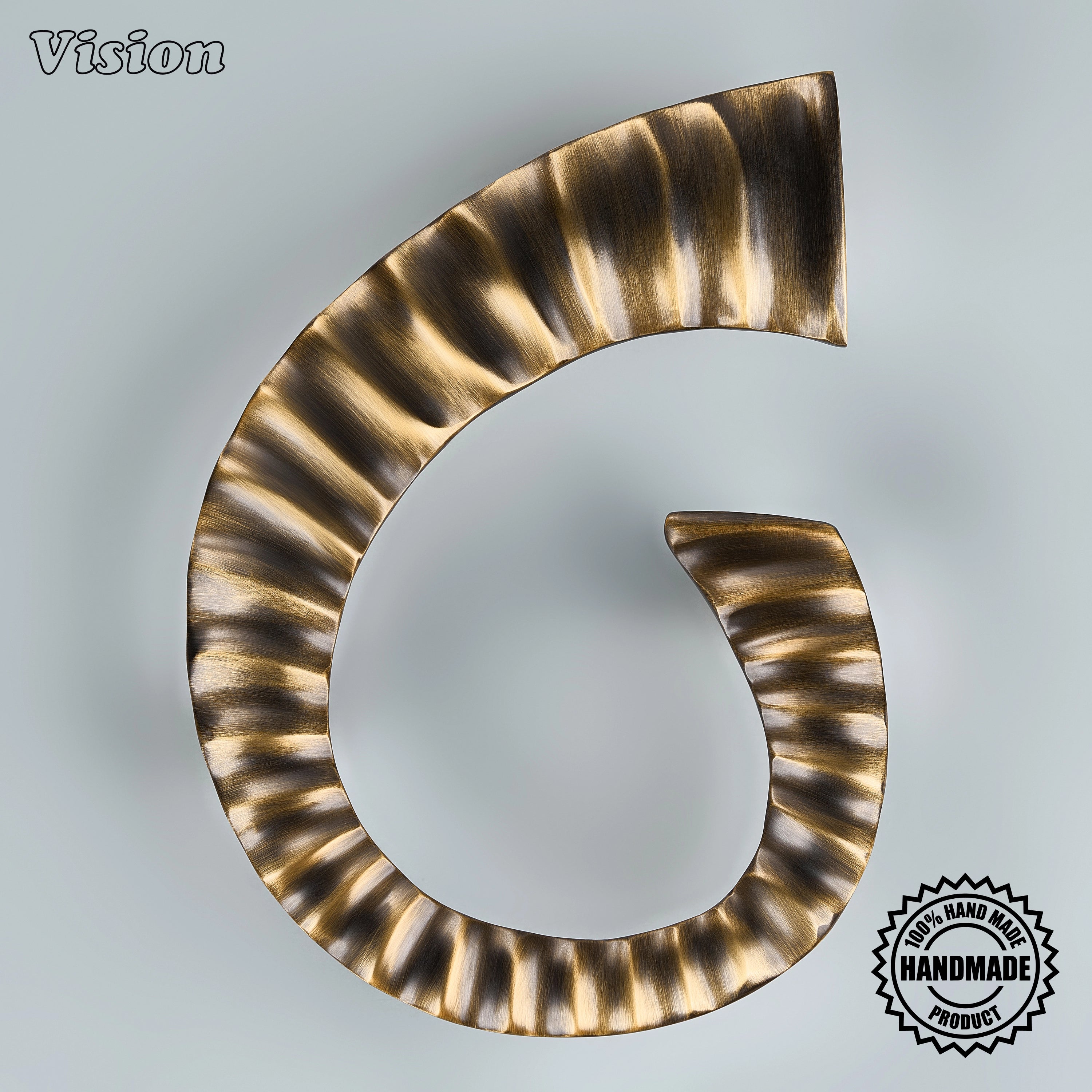 Antique Bronze handcrafted textured door handle with artistic sunburst detailing for luxury entrances.
