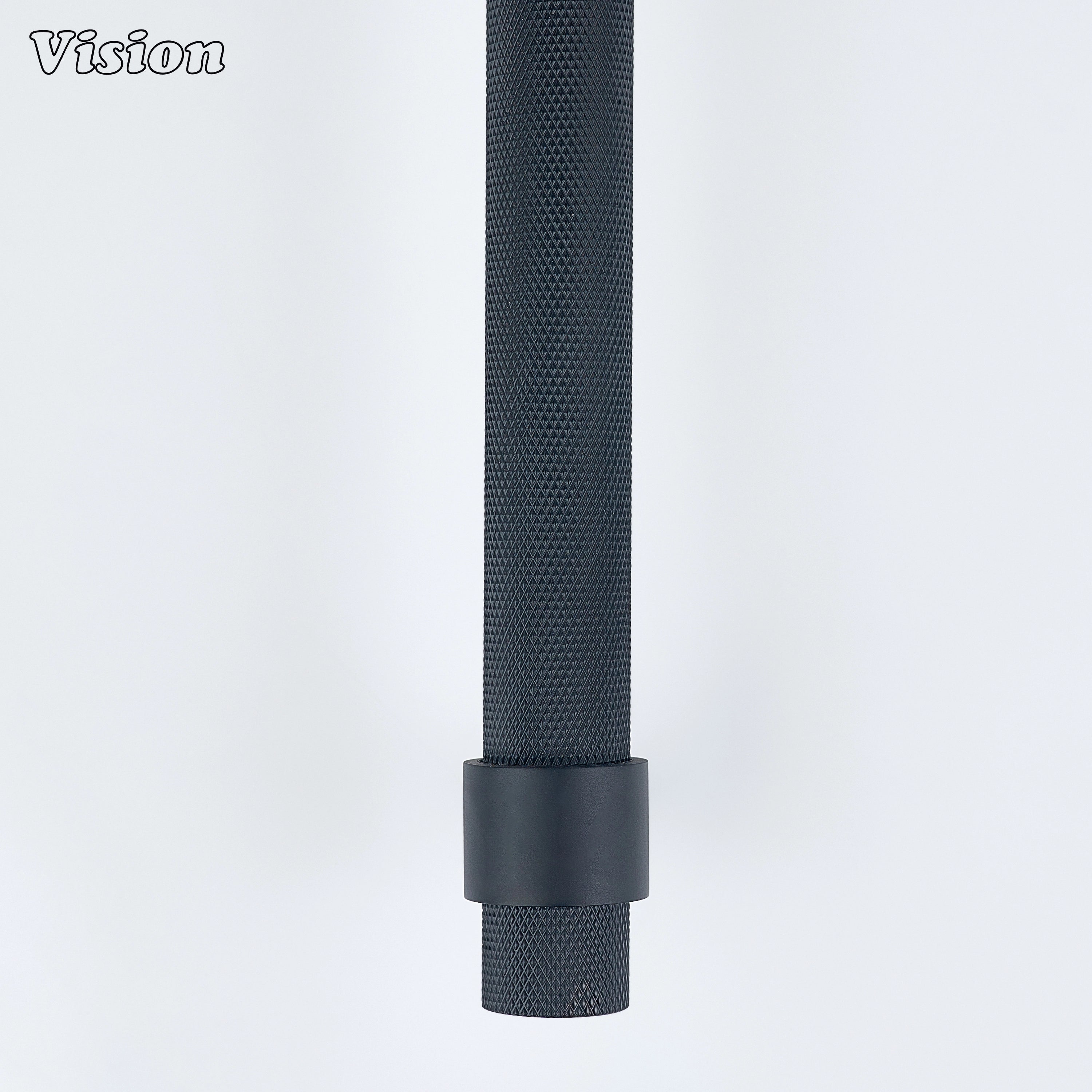Black solid brass appliance pull with precision-machined grip for integrated kitchens.