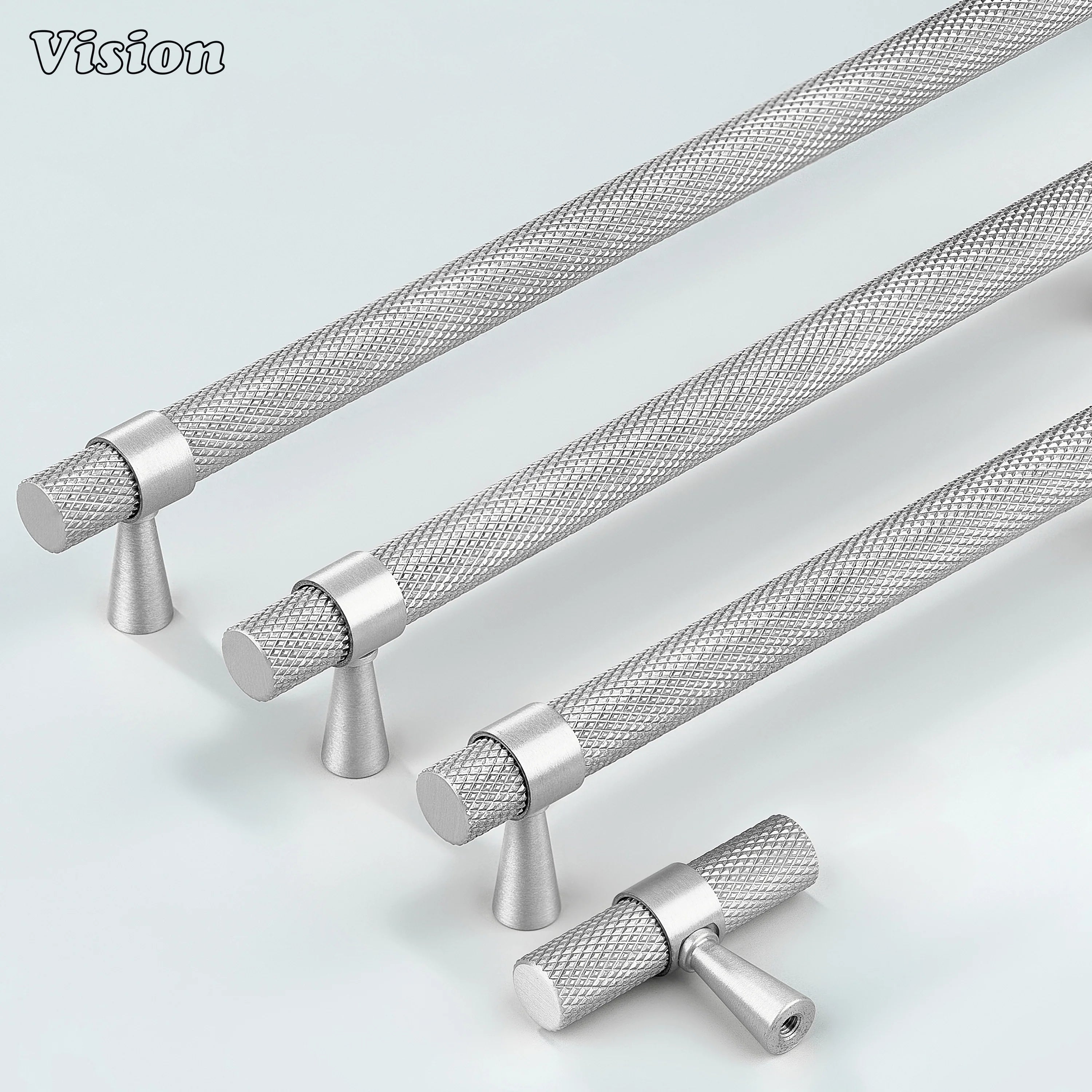 Sleek silver knurled handle used for cupboards and furniture.