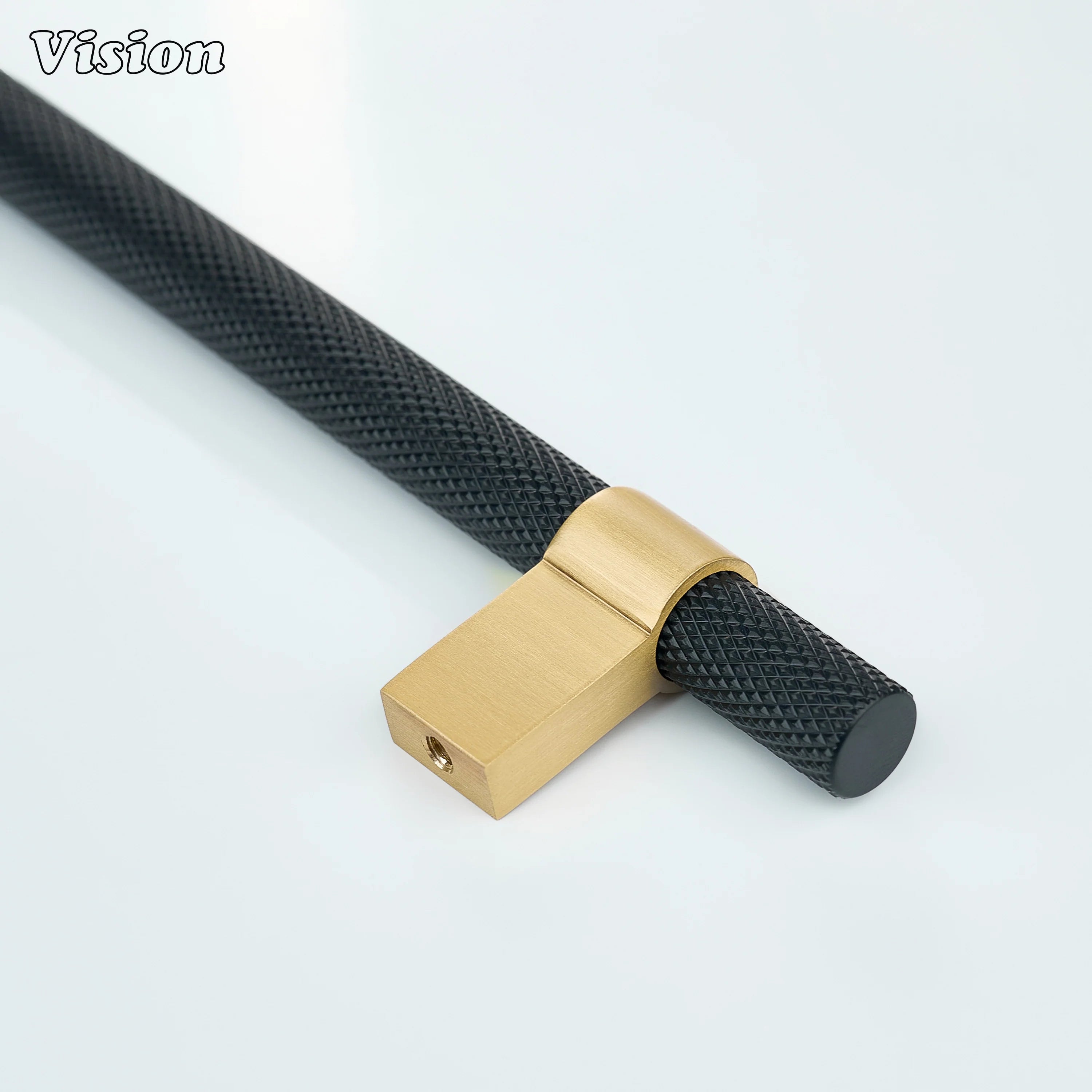 Designer knurled cabinet handle in Black and Gold with solid bar form for furniture drawers