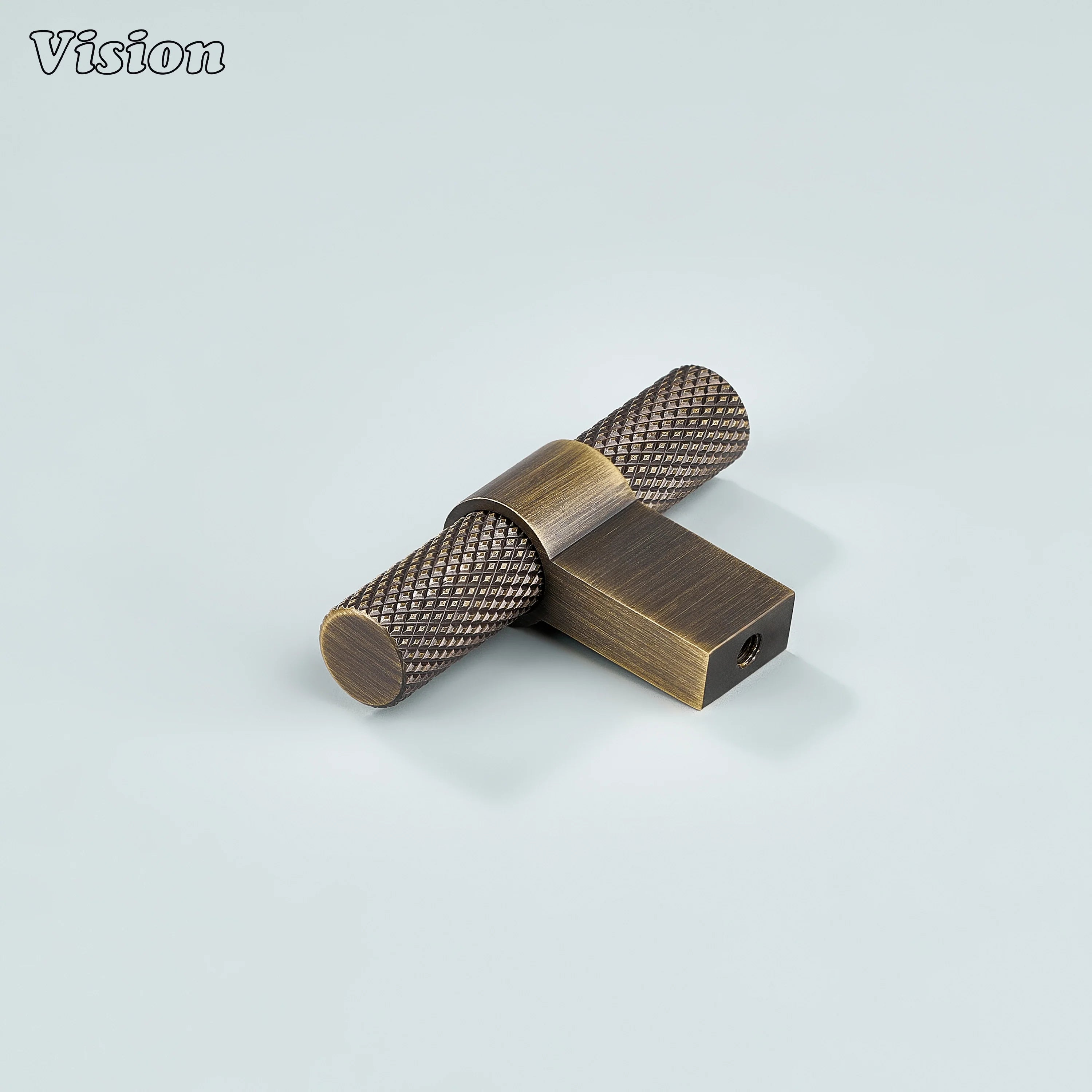 Classic antique bronze knurled T-knob with ringed leg for vintage interiors.