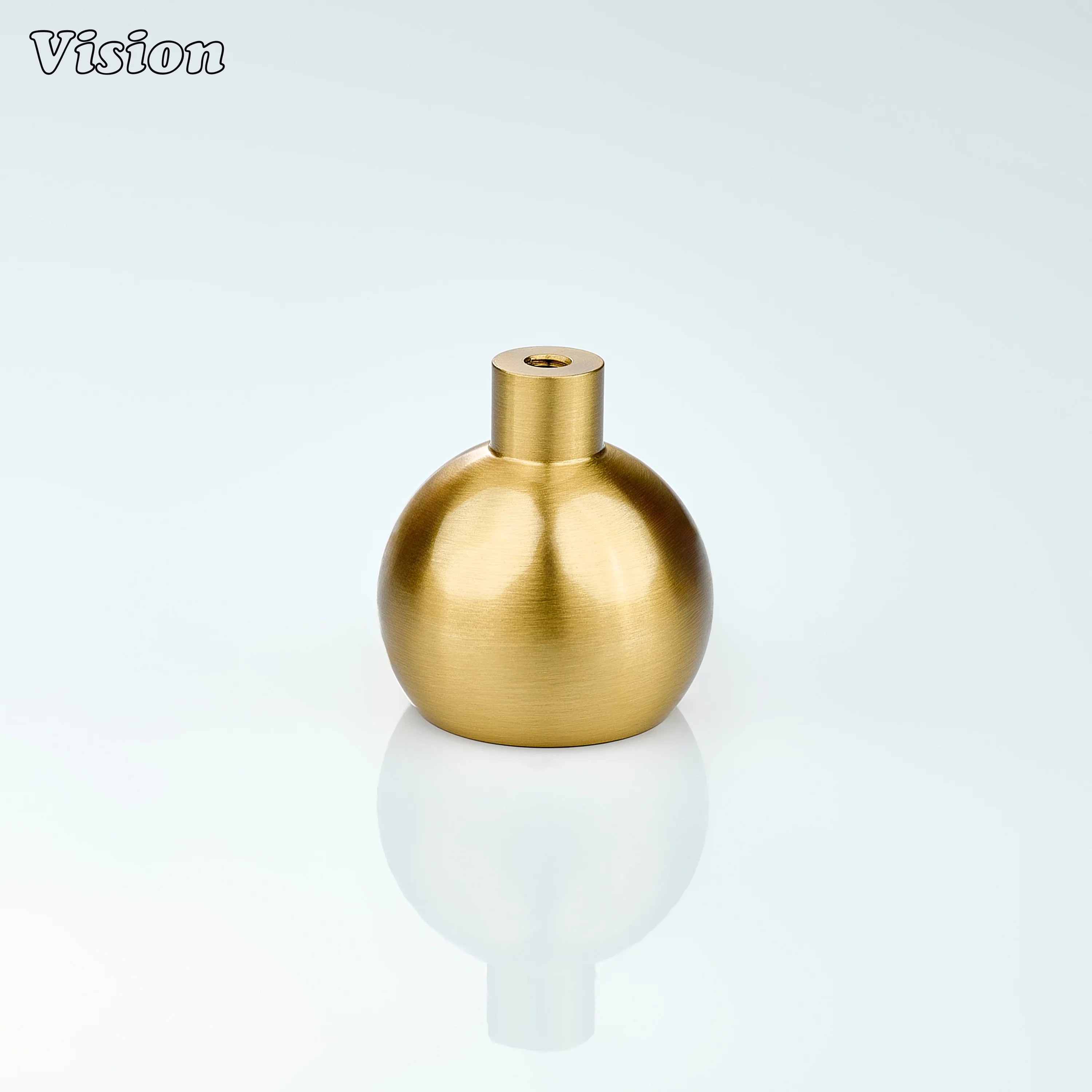 Gold round cabinet knob with plain profile and fine linear texture, designed for luxury furniture drawers