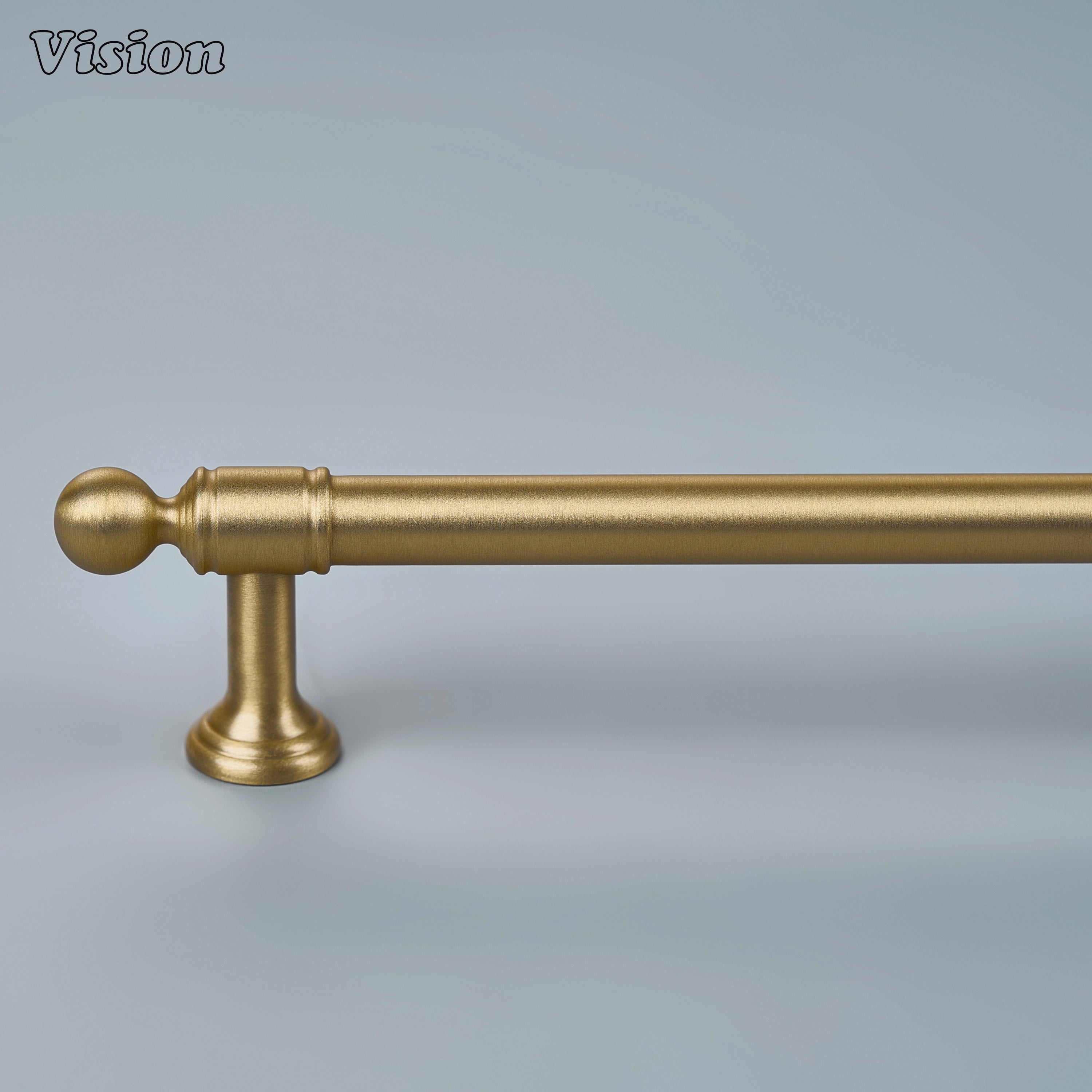 Heavy-duty gold brass cabinet pull with geometric profile on custom armoires