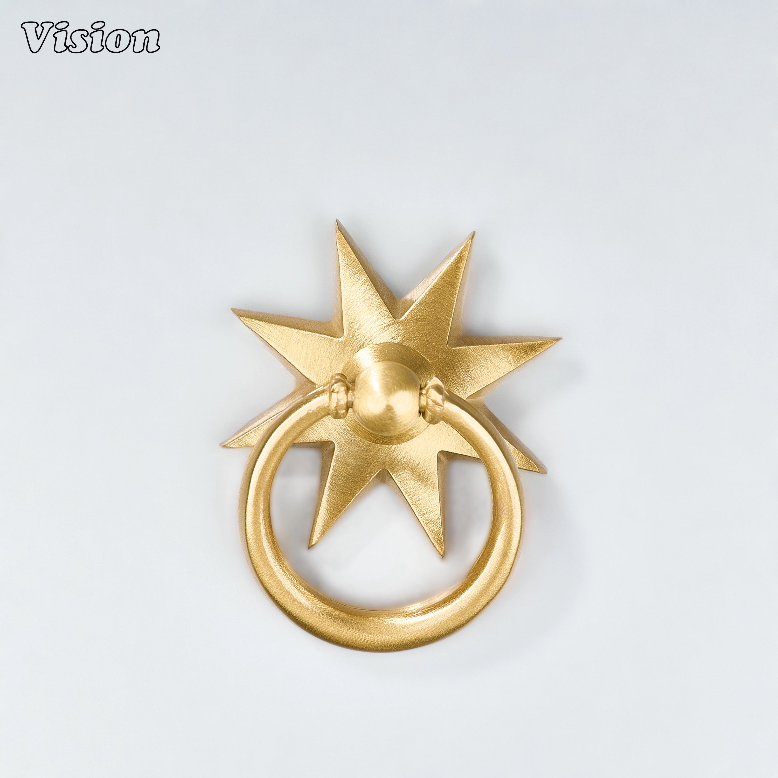 Gold plain ring pull with sculpted star backplate for custom cabinetry and furniture pieces