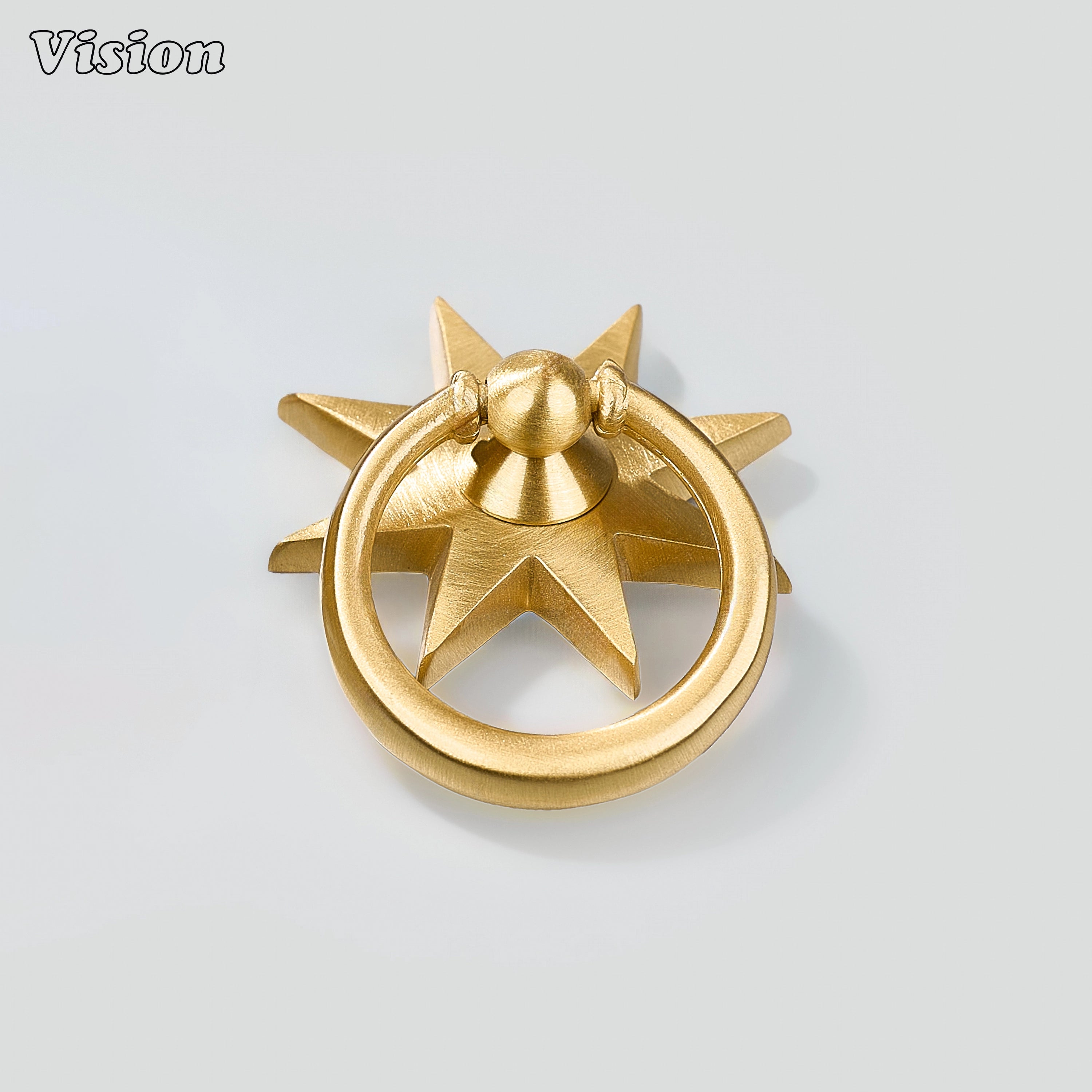 Gold plain medallion pull with rounded ring and geometric star detail for buffet cabinets