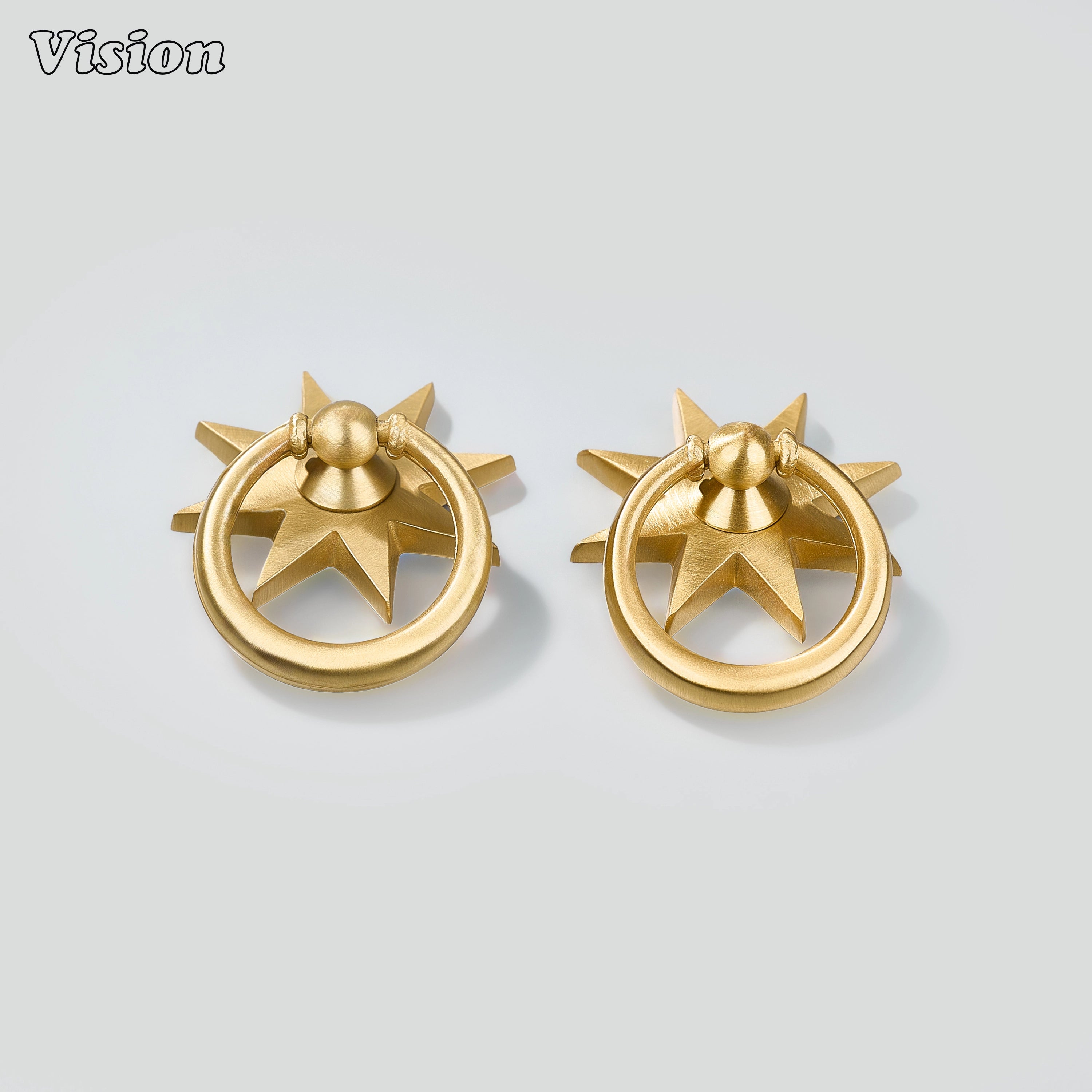 Gold plain cabinet pull with star-shaped backplate and circular ring for vanity drawers and cabinets