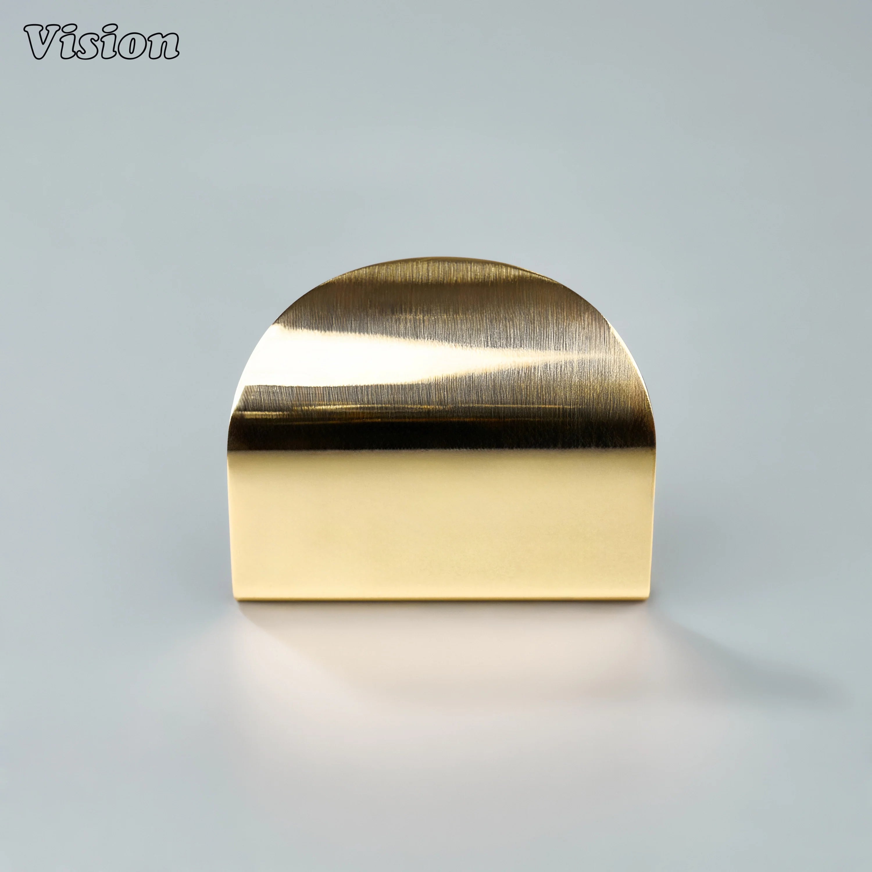 Plain curved cabinet handle in Polished Brass Unlacquered finish with sleek round edge detail for cabinet doors