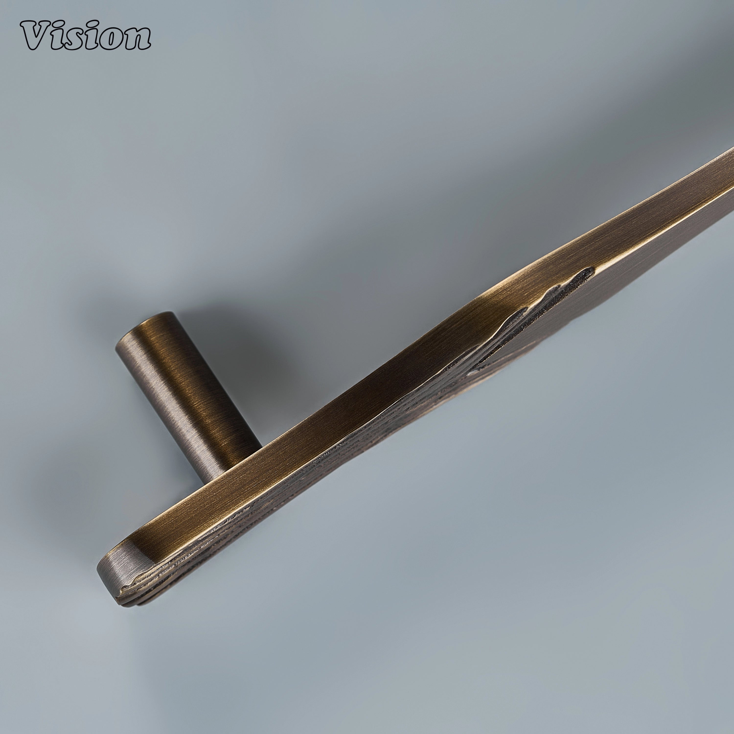 Antique bronze sculpted cabinet pull with handcrafted driftwood texture and legs for luxury joinery