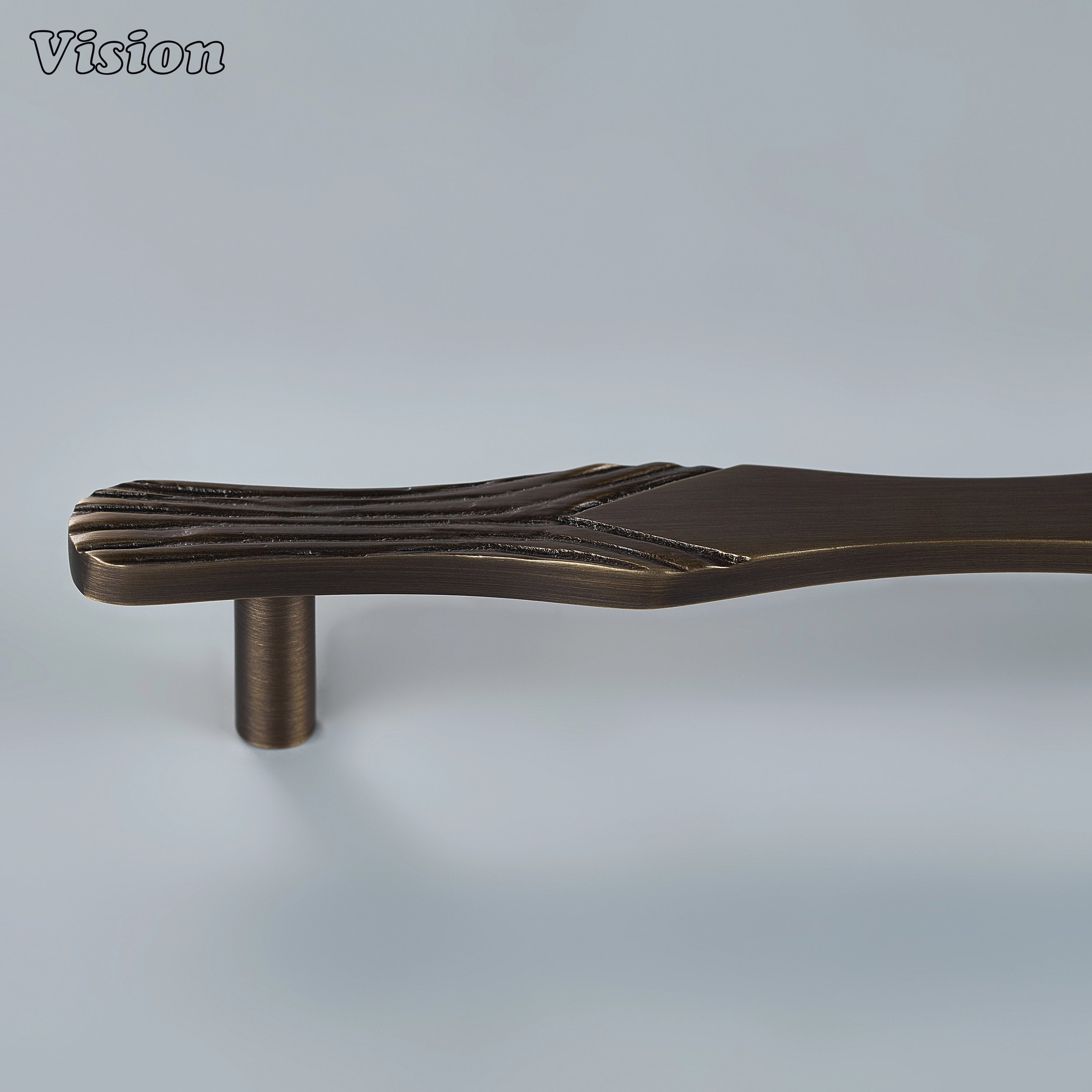 Artisan antique bronze solid brass cabinet handle with artistic carved design for contemporary armoires