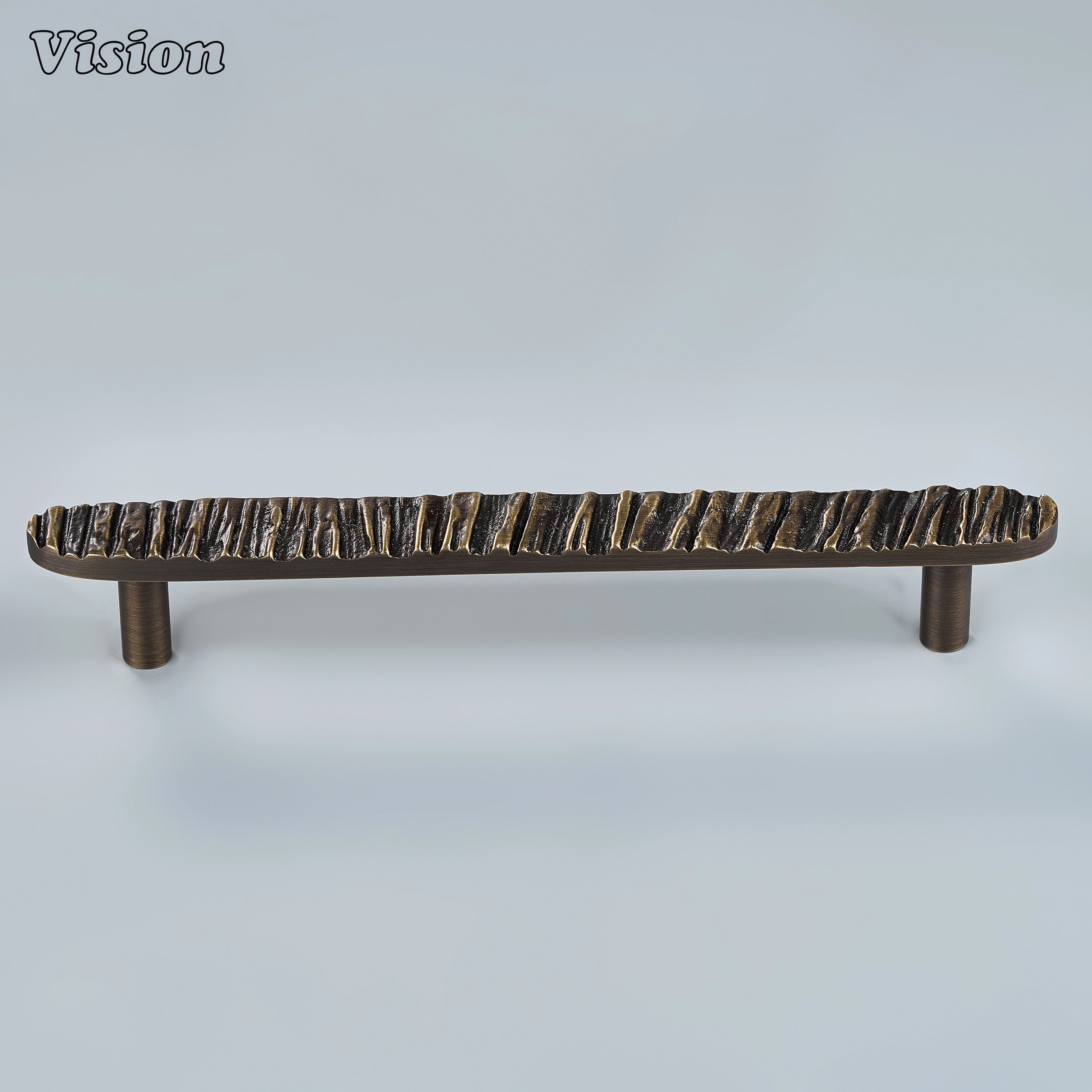 Handcrafted cabinet pull in antique bronze finish featuring a textured linear bar for wardrobes