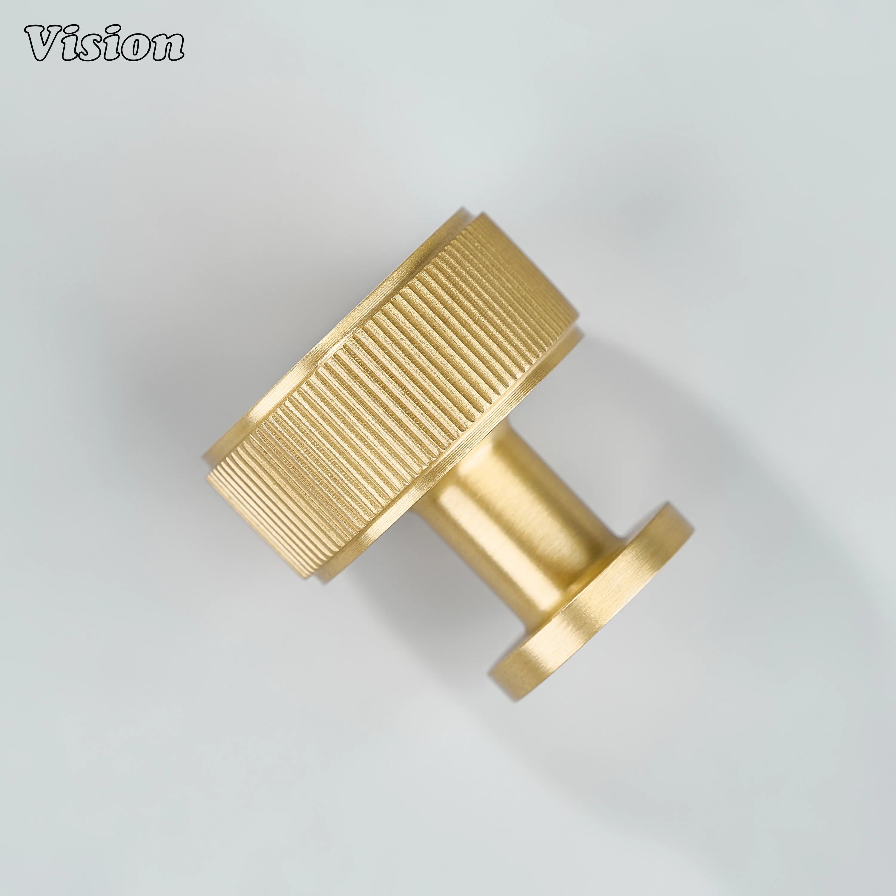 Solid brass linear knurled round cabinet knob in Gold for modern wardrobe storage units
