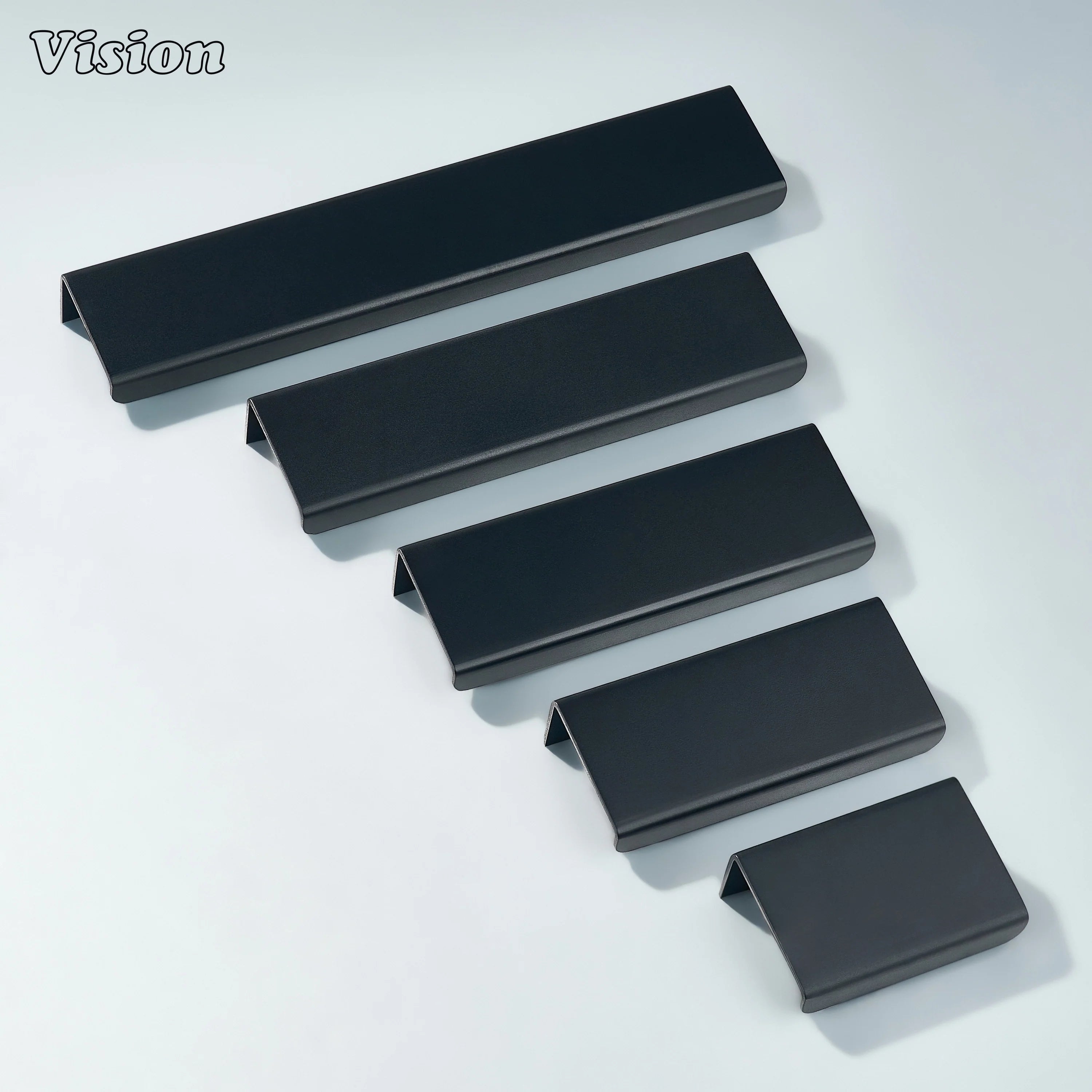 Black cabinet handle with clean linear edge pull style for furniture fronts