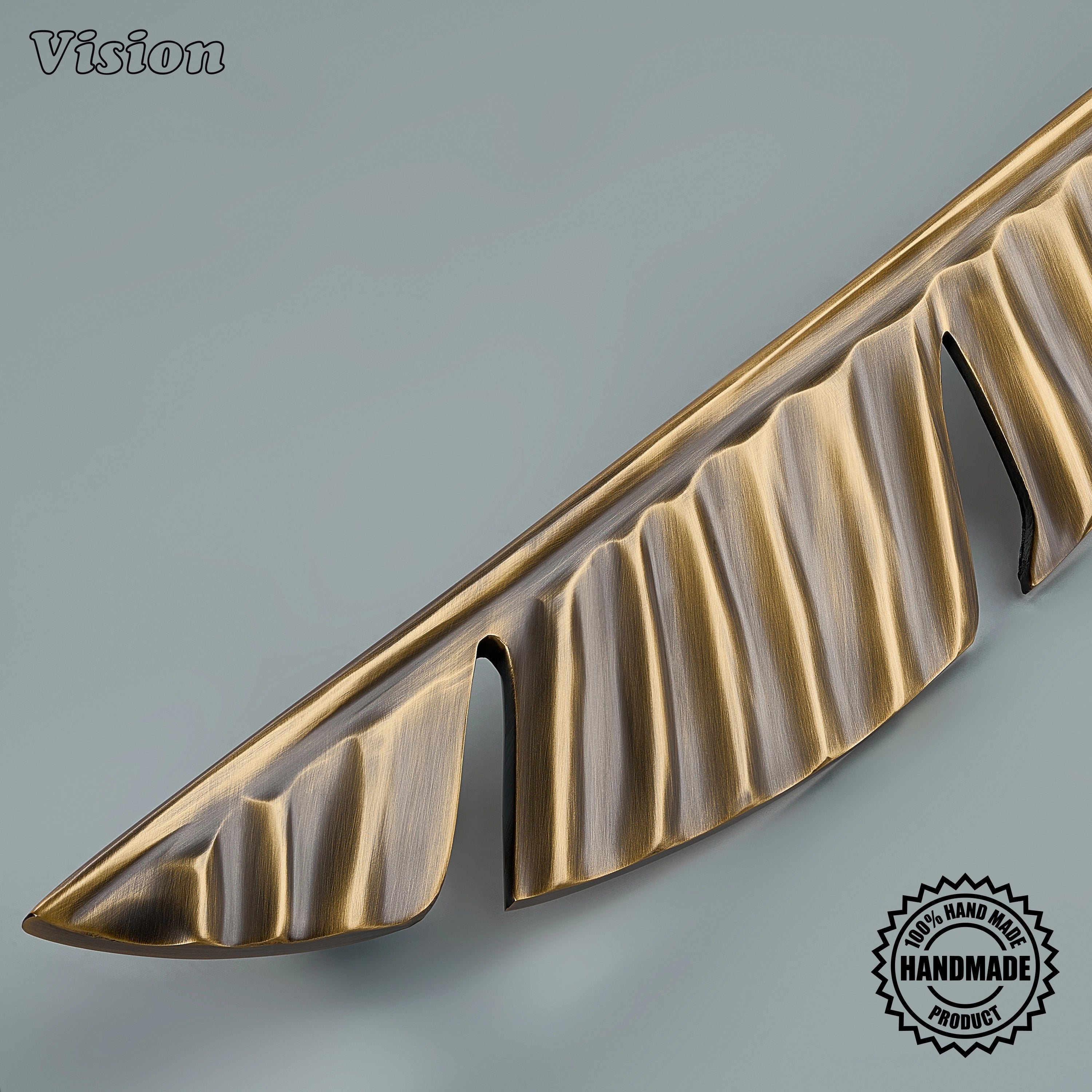 Antique Bronze plain profile cabinet handle featuring sculpted botanical detailing for refrigerator panels.