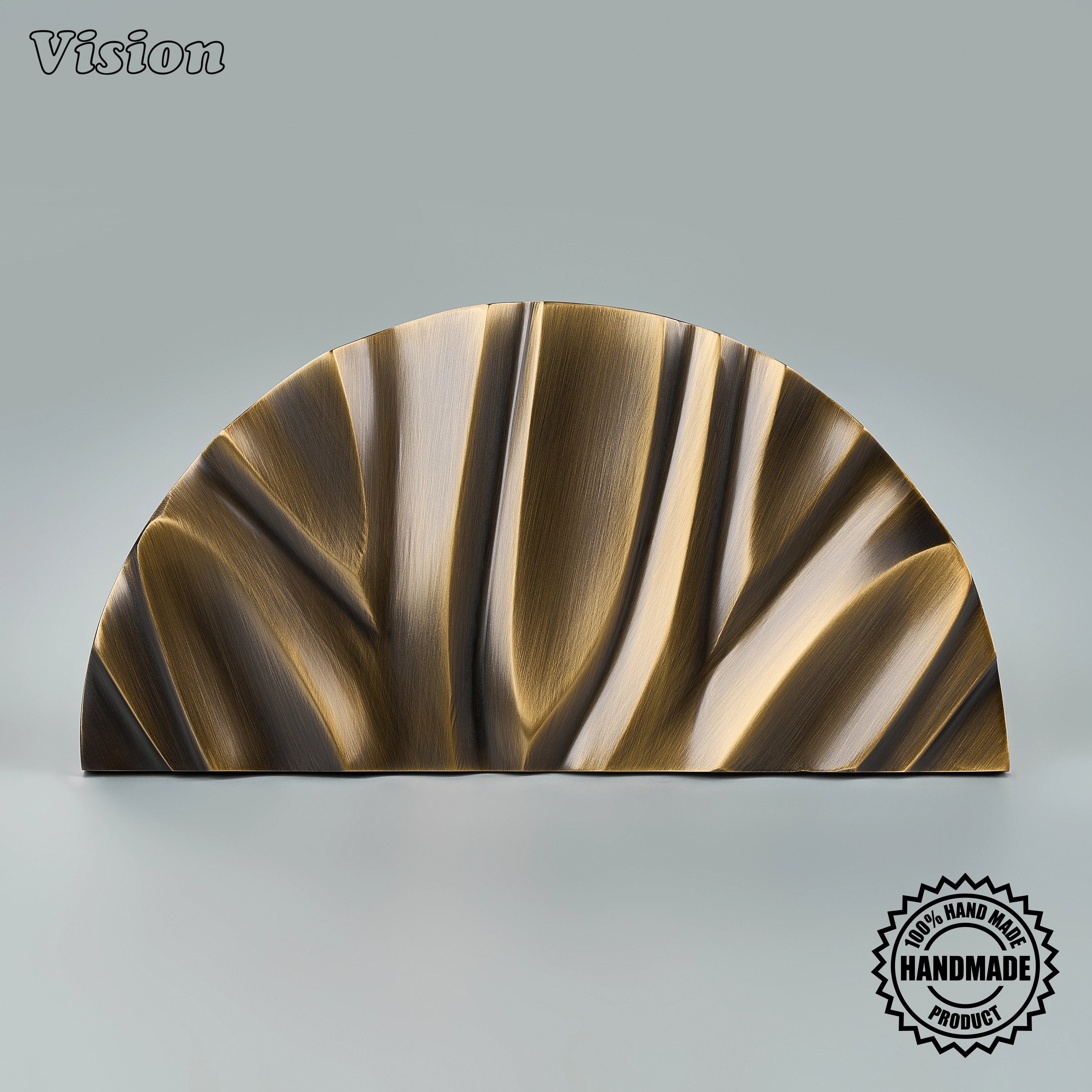 Solid brass Antique Bronze semi circle door handle with flowing carved surface for contemporary residential entry doors.