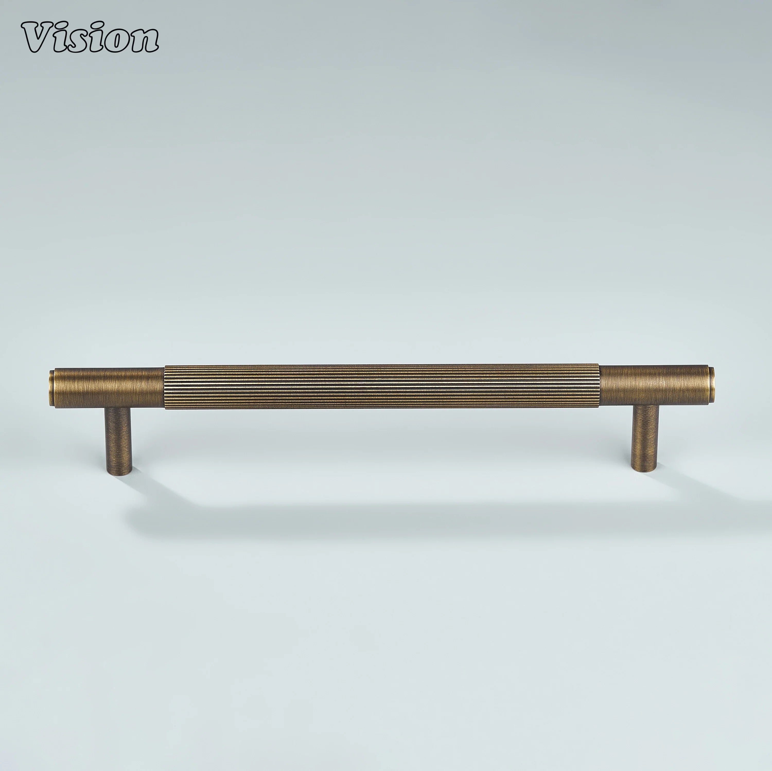 Elegant antique bronze cabinet handle for kitchen interiors.