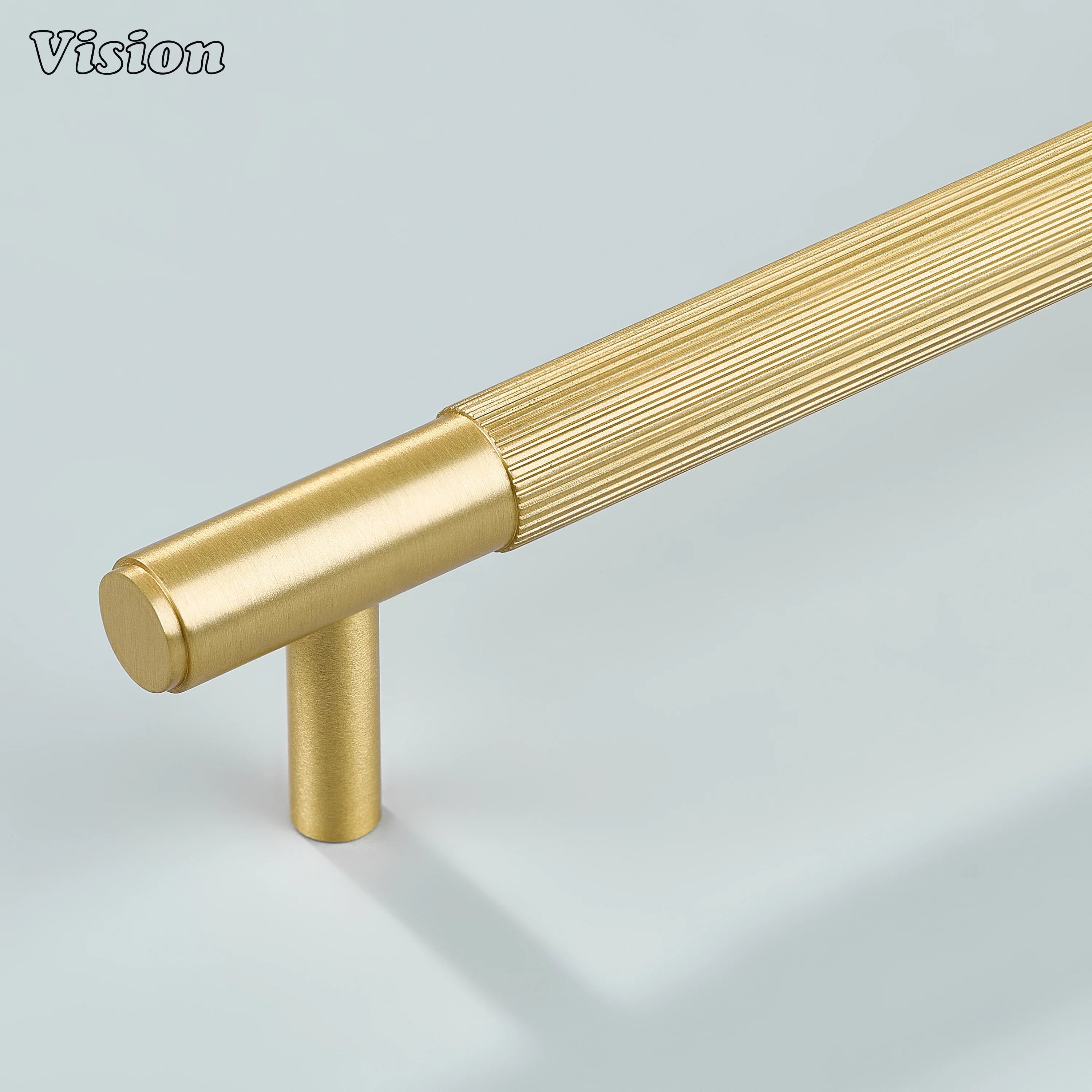Gold satin brass linear knurled cabinet handle for modern kitchens.