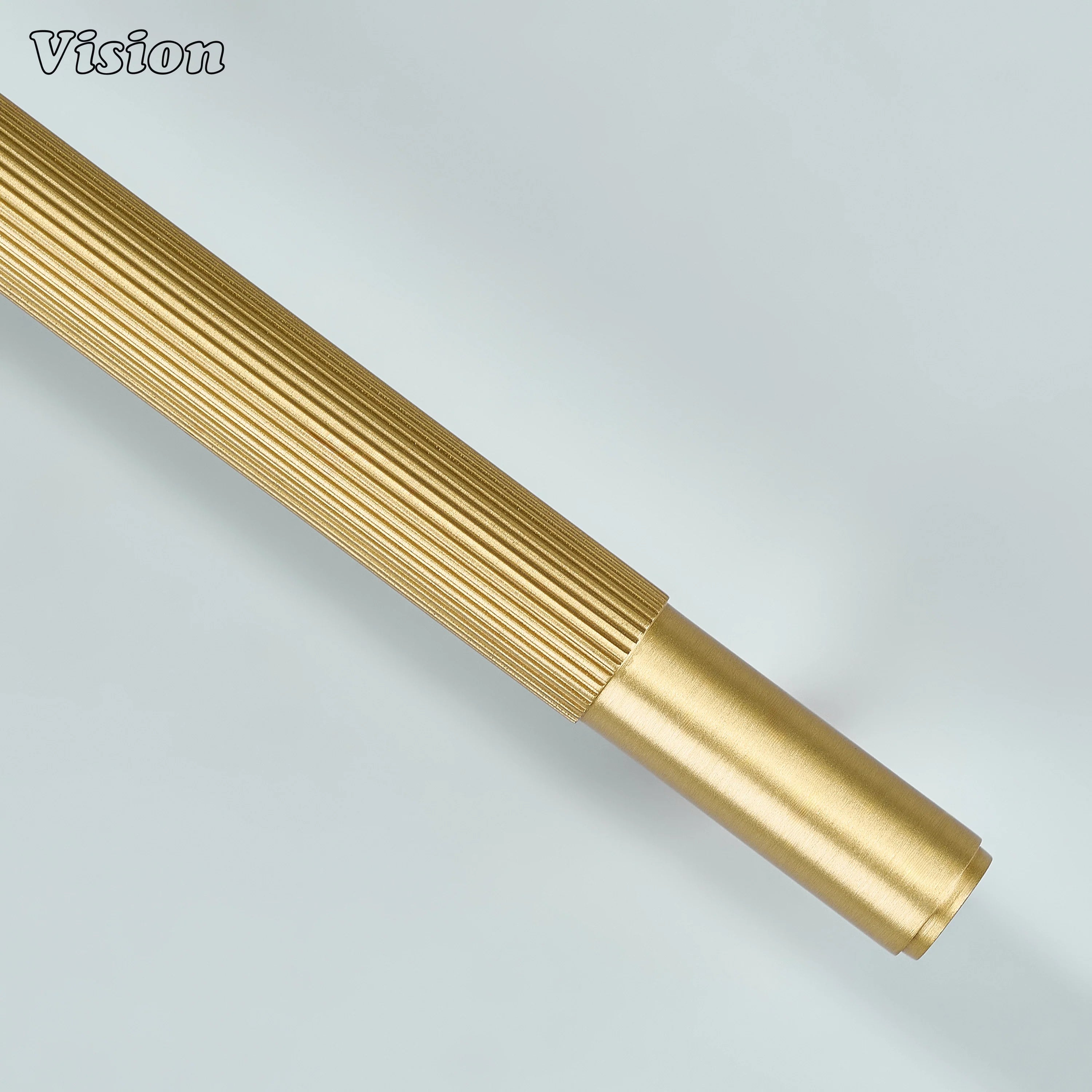 Modern gold linear handle for home interior cabinetry.