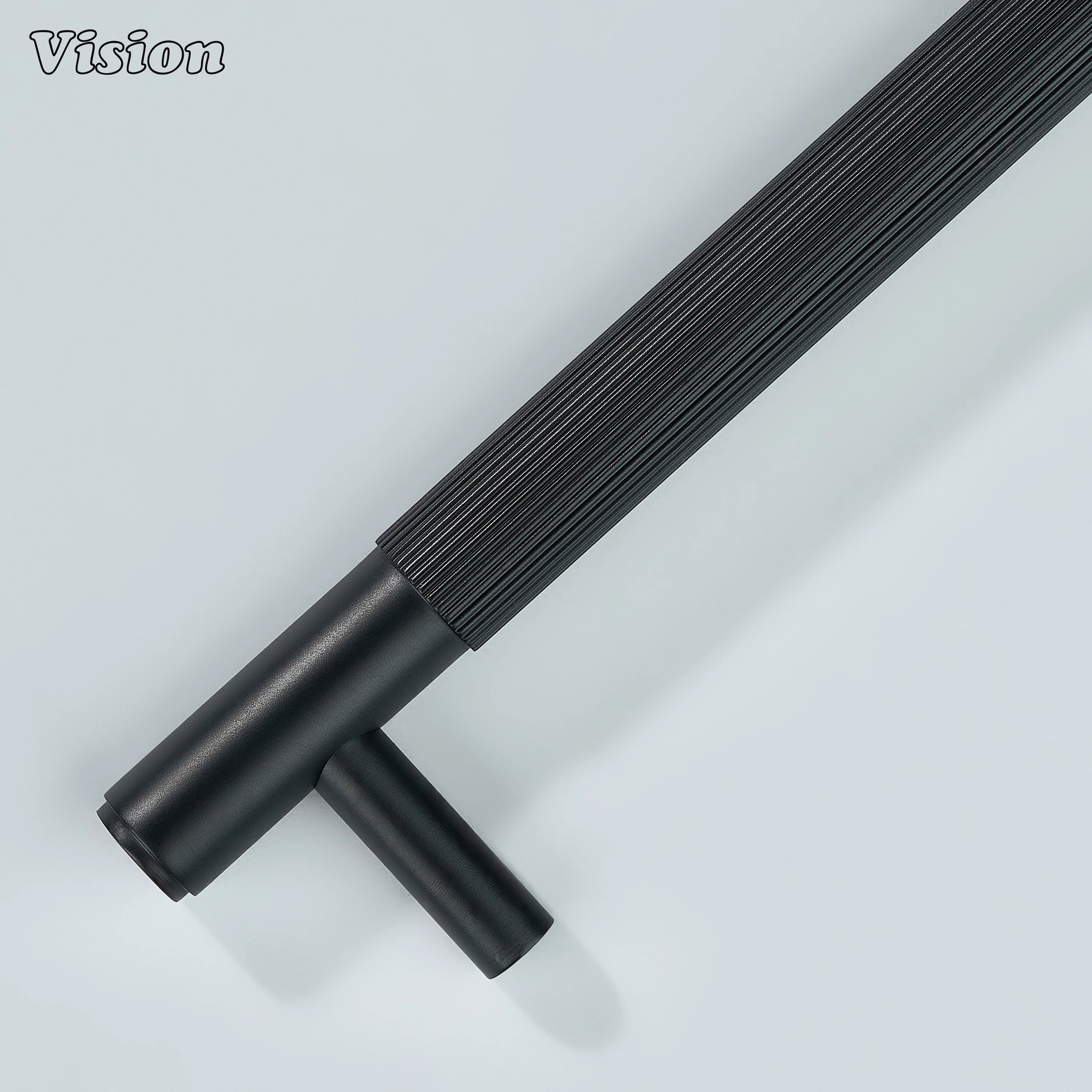 Ignite black linear cabinet handle with satin brass base.