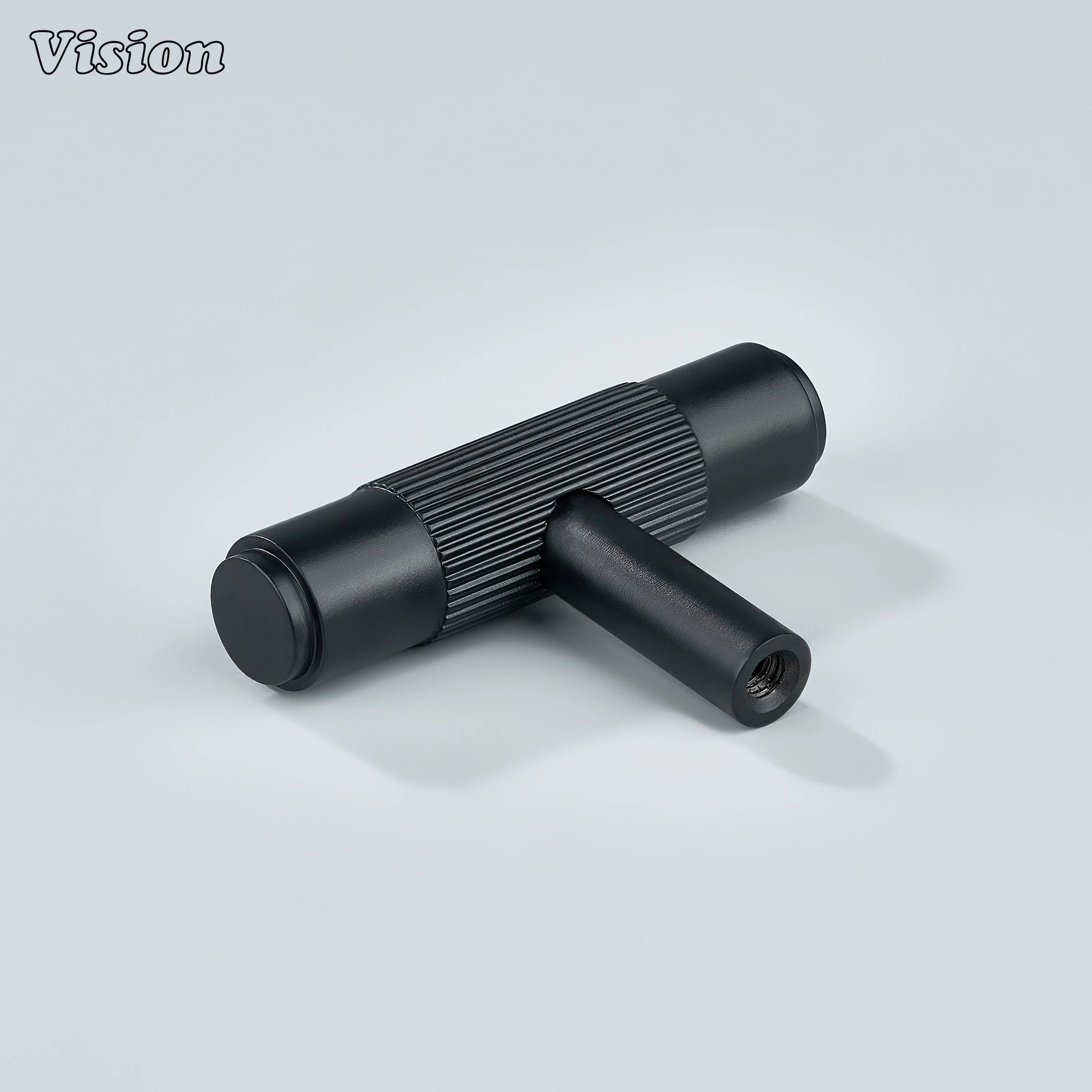 Matte black cabinet knob with linear knurling pattern.