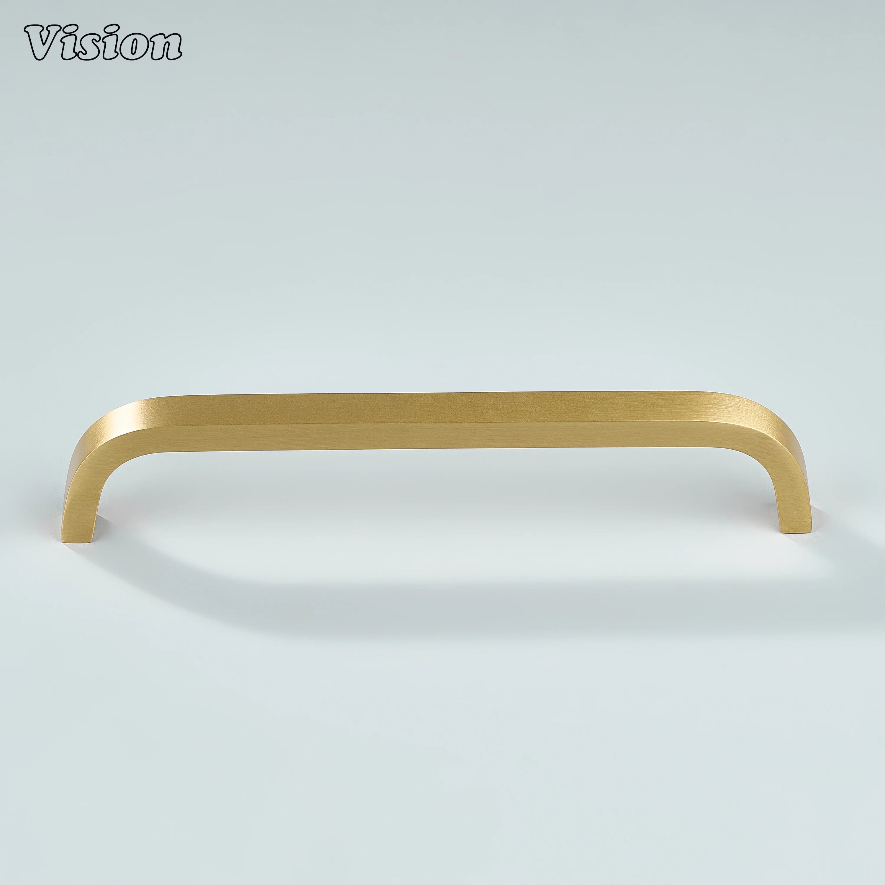 Sleek gold brass handle designed for modern kitchen interiors.