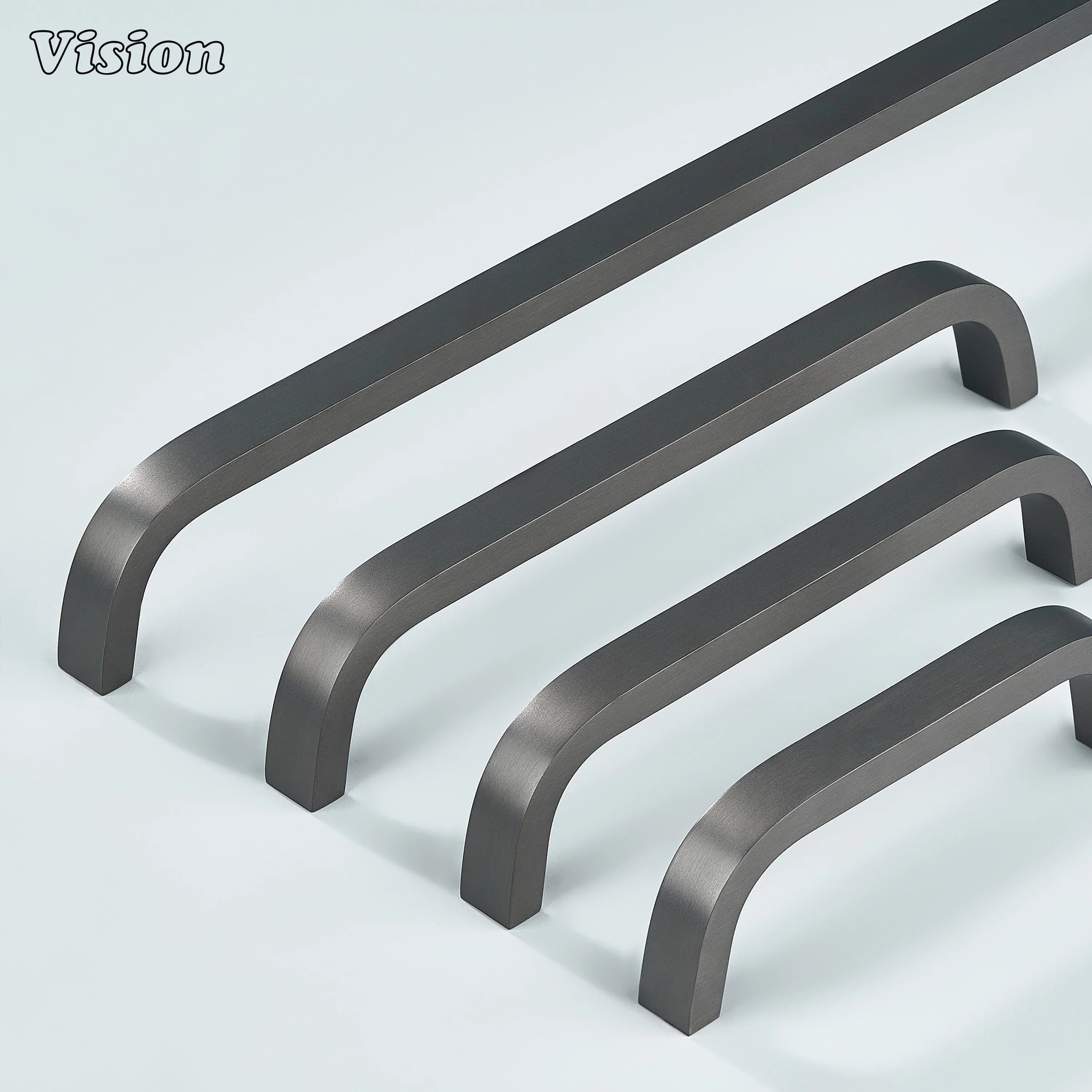 Sleek brass handle in gunmetal finish for wardrobes and furniture.