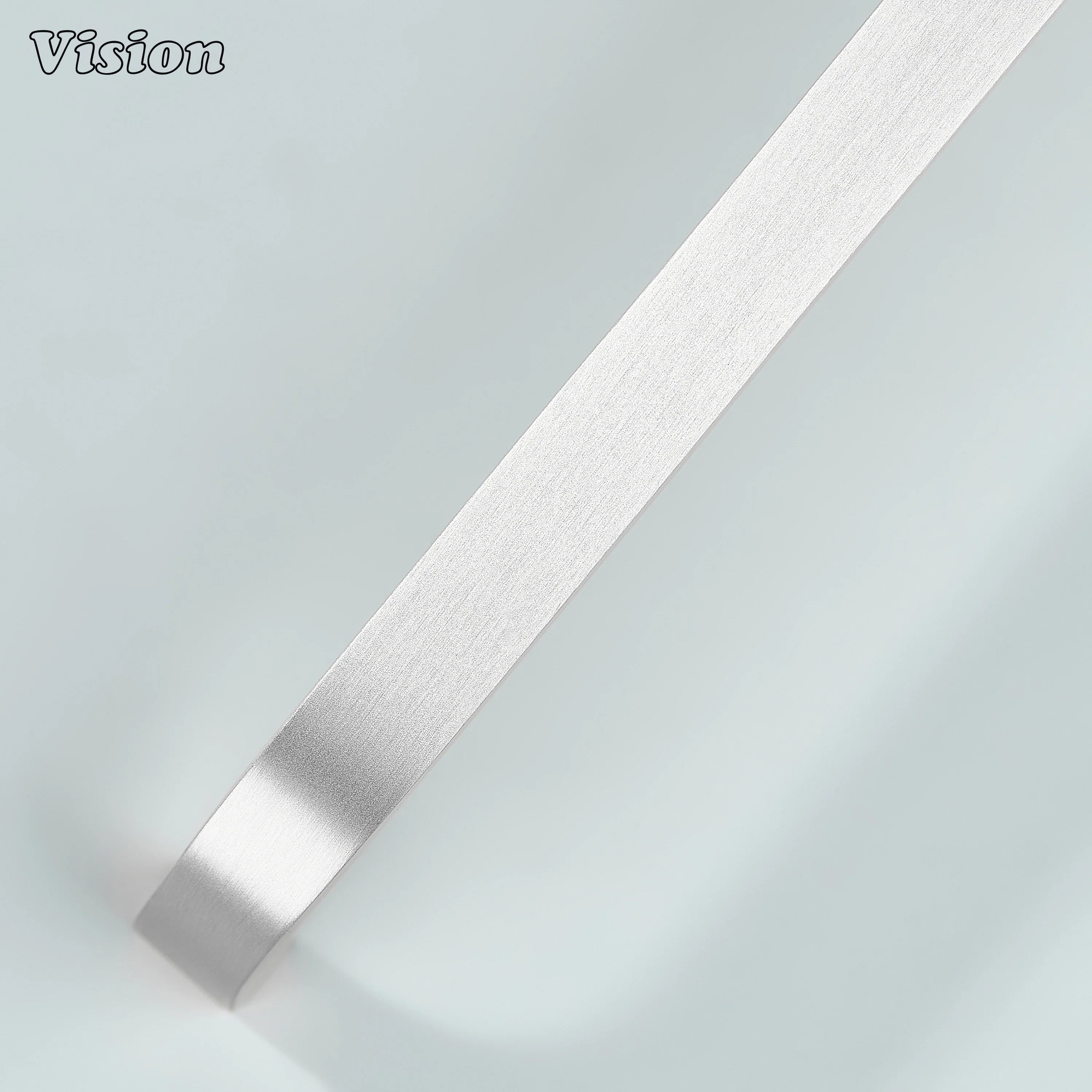 Modern silver curved brass pull for kitchen interiors.