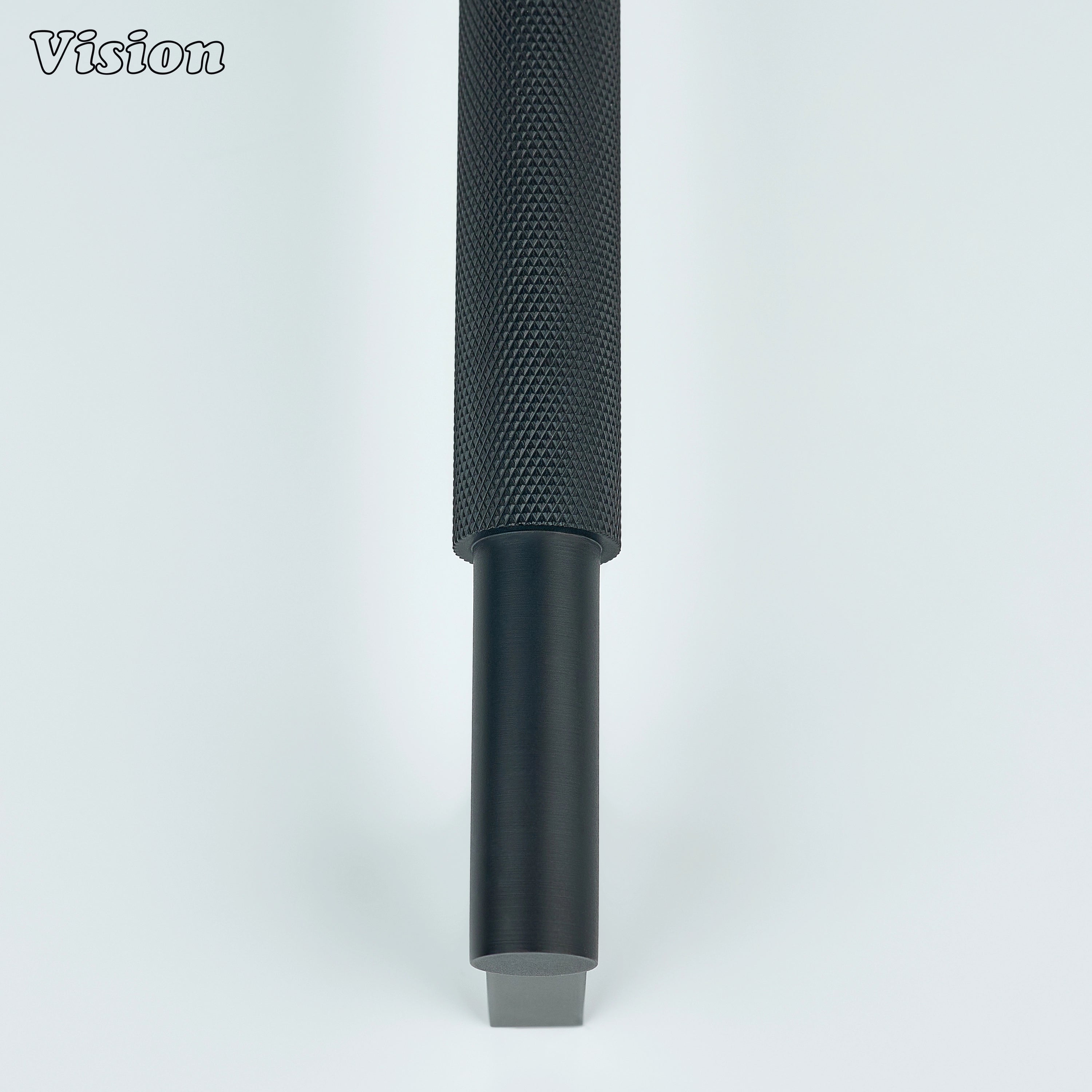 Black appliance pull with solid brass construction for large cabinet doors.